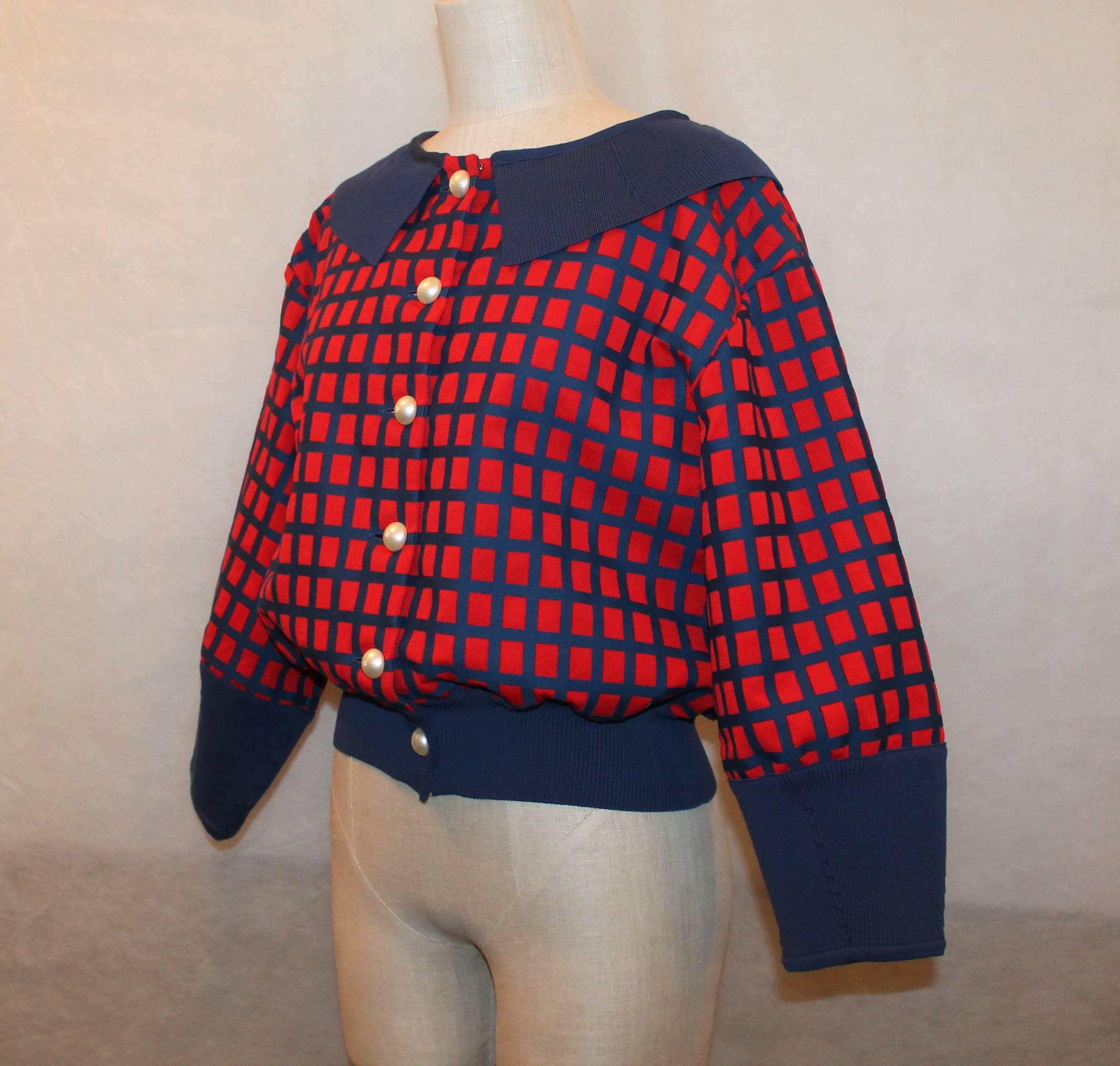 Chanel Red and Blue Windowpane Print Jacket w/ Pearl Buttons - 42 This jacket is 100% cotton and is in excellent condition. It also has a blue trim on the collar and cuffs of the sleeves. The pearl buttons have the classic Chanel 