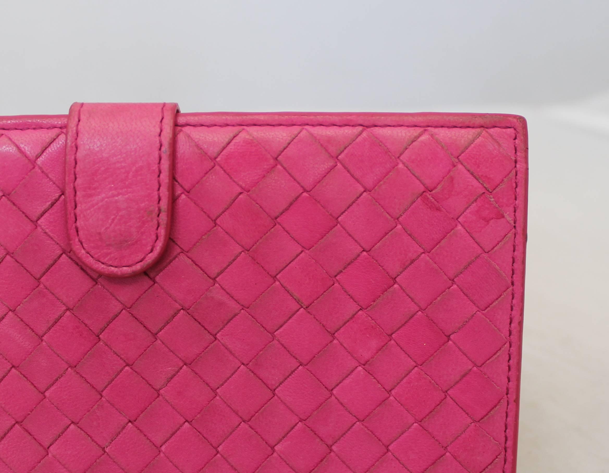 Bottega Veneta Pink Woven Leather Wallet.  This wallet is in fair condition; it has wear on the leather, slight water stain on top right corner of the front, and some wear along the edges.  It has beautiful, smooth leather woven detail.  The