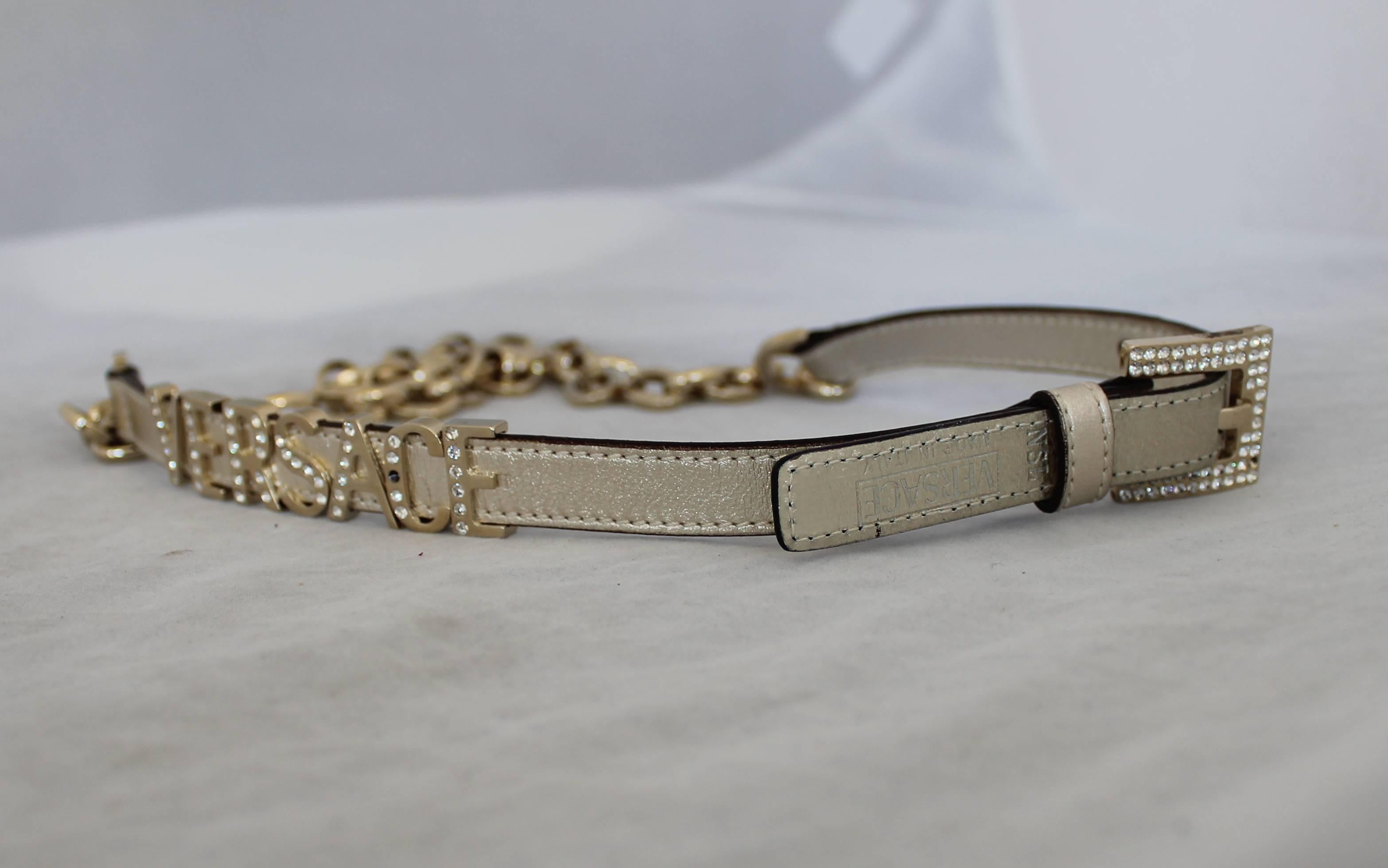 Versace Gold Leather & Chain Link w/ Rhinestones and Rhinestone Buckle - 36
 This belt is in good condition. It is half chain link and half leather. The word 