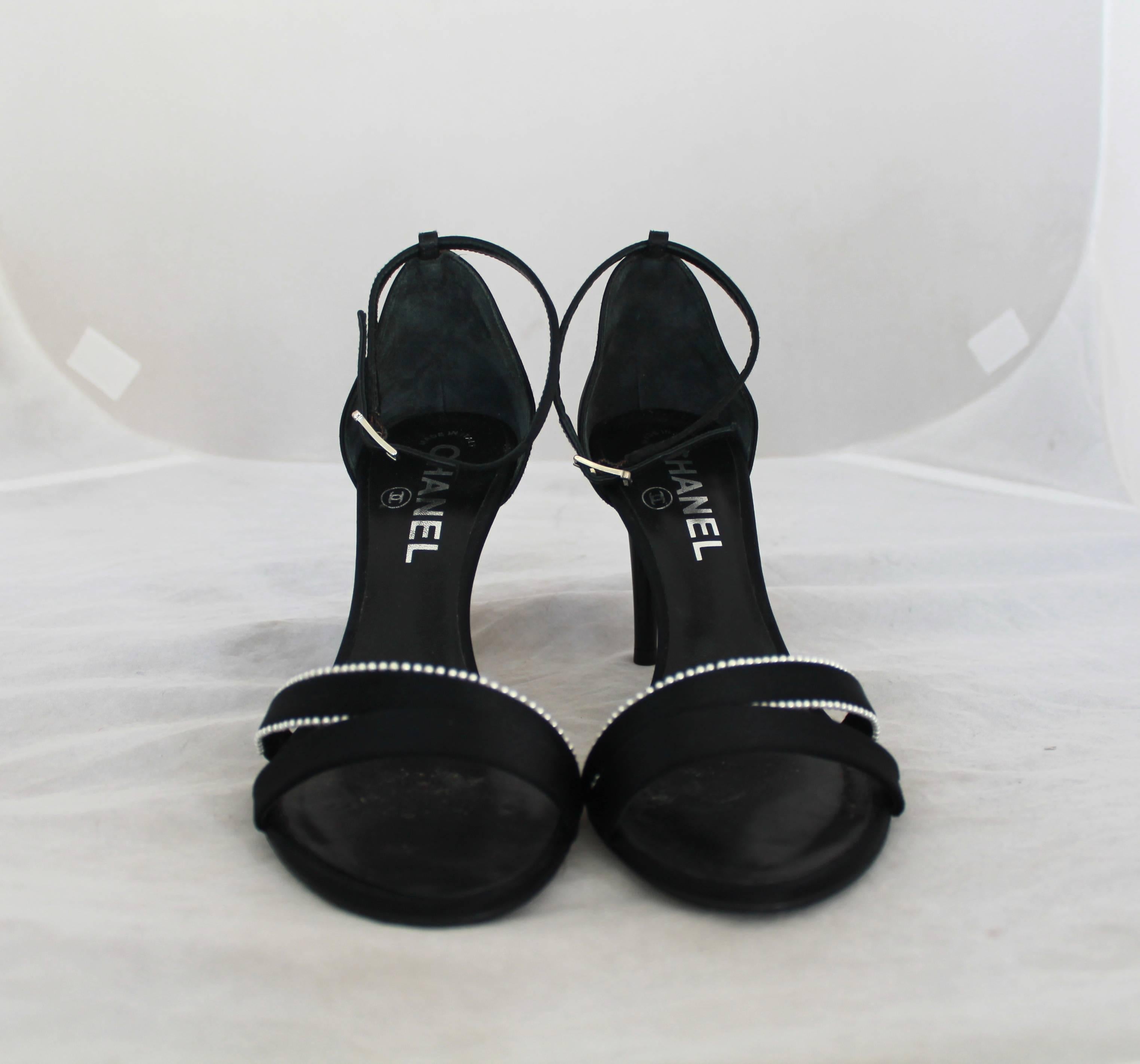 Chanel Black Satin Double Front Strap Heels w/ Ankle Strap & Mini Pearl Trim - 37.  These double front strap heels have an elegant ankle strap and a beautiful mini pearl trim.  They have a silver 