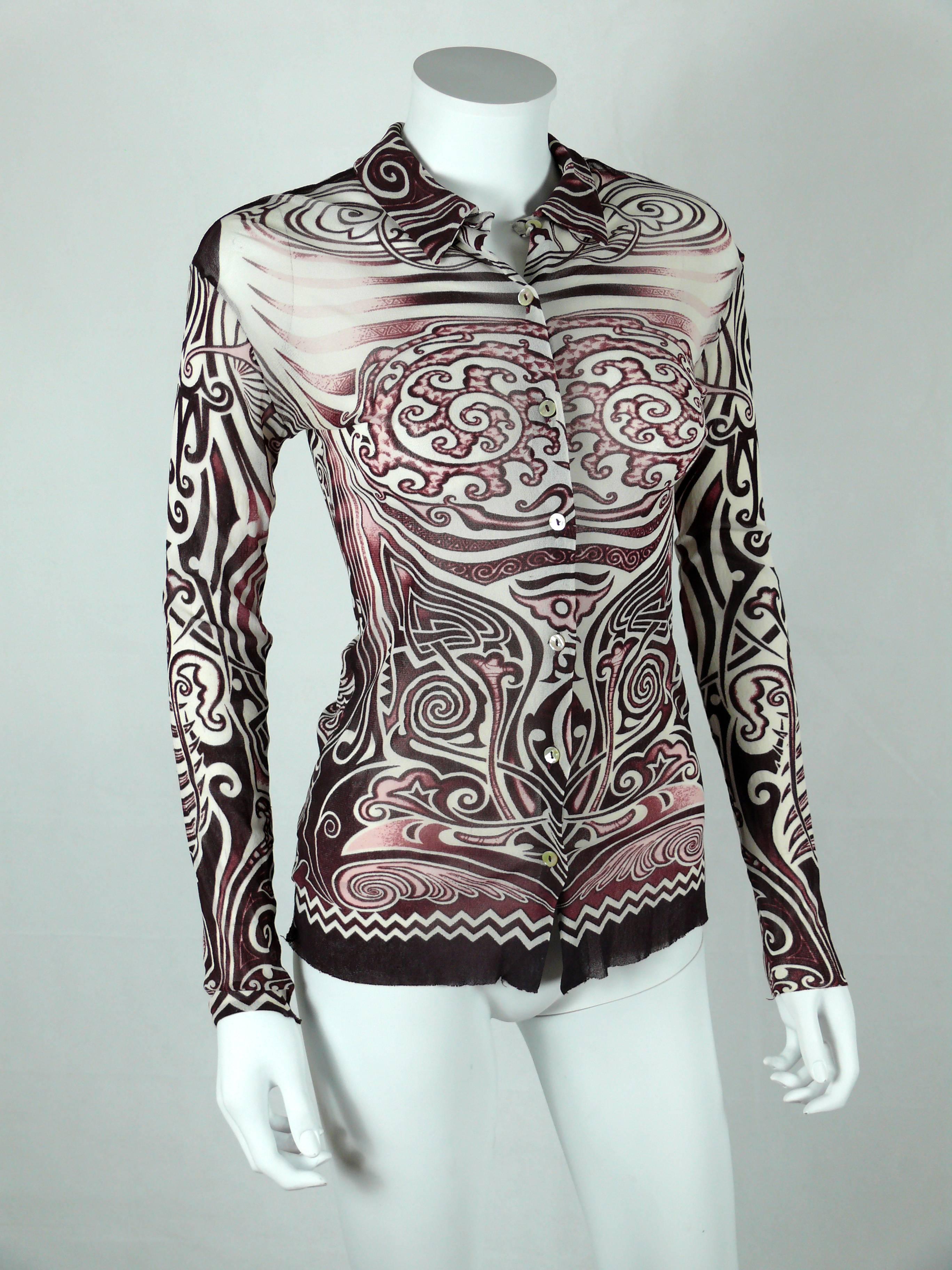 JEAN PAUL GAULTIER vintage streetchy unisex Fuzzi mesh tribal tatoo shirt.

Label reads JEAN PAUL GAULTIER Maille.

Marked size : M.
Please refer to measurements.

Composition label reads : 100% nylon.

Indicative measurements taken laid