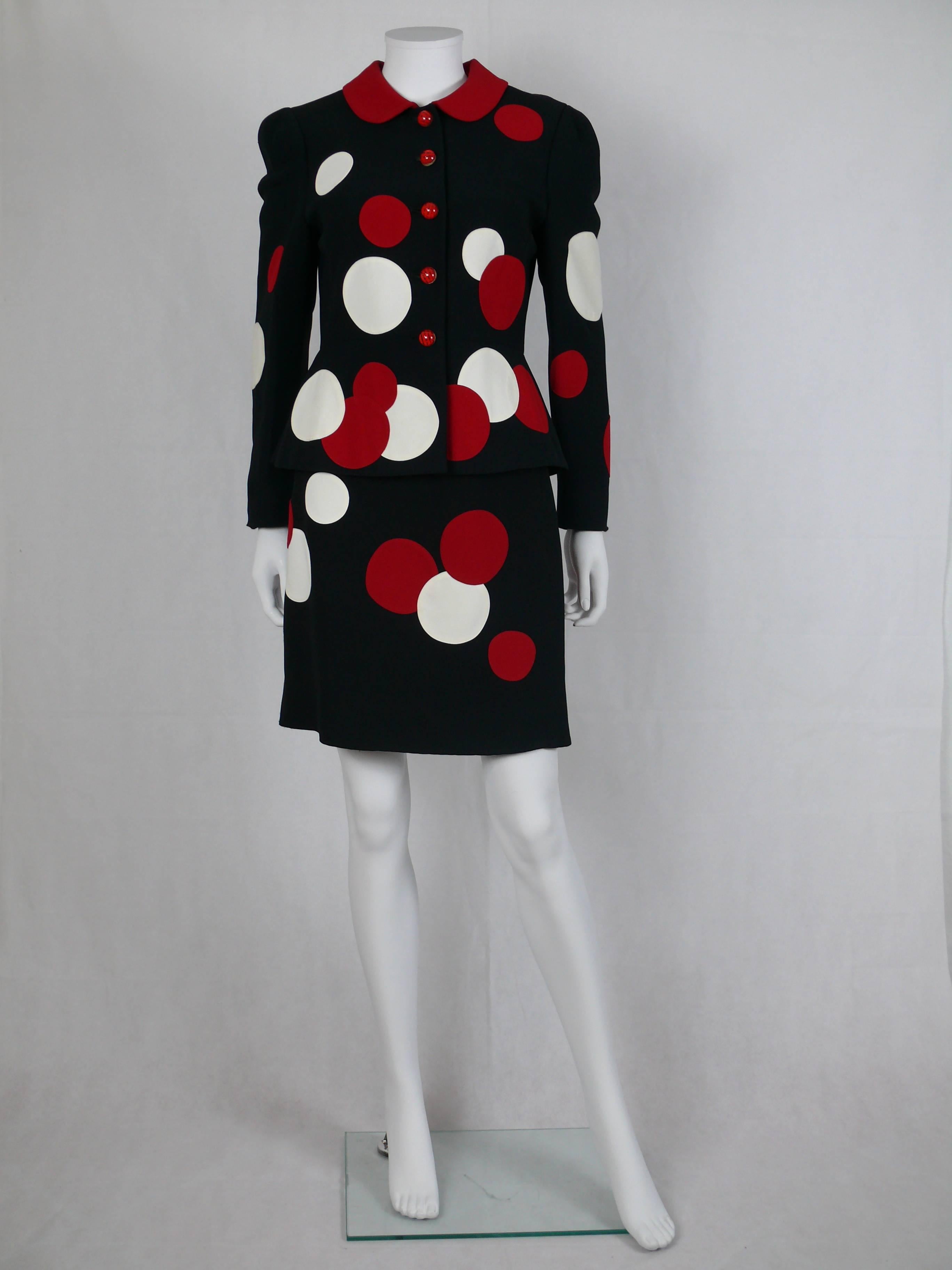 MOSCHINO vintage black, red and white polka dot skirt suit.

Blazer features a Peter Pan collar, front button fastening and long sleeves.
Fitted.

Matching skirt is fitted and has a concealed zip fastening.

Both blazer and skirt are fully