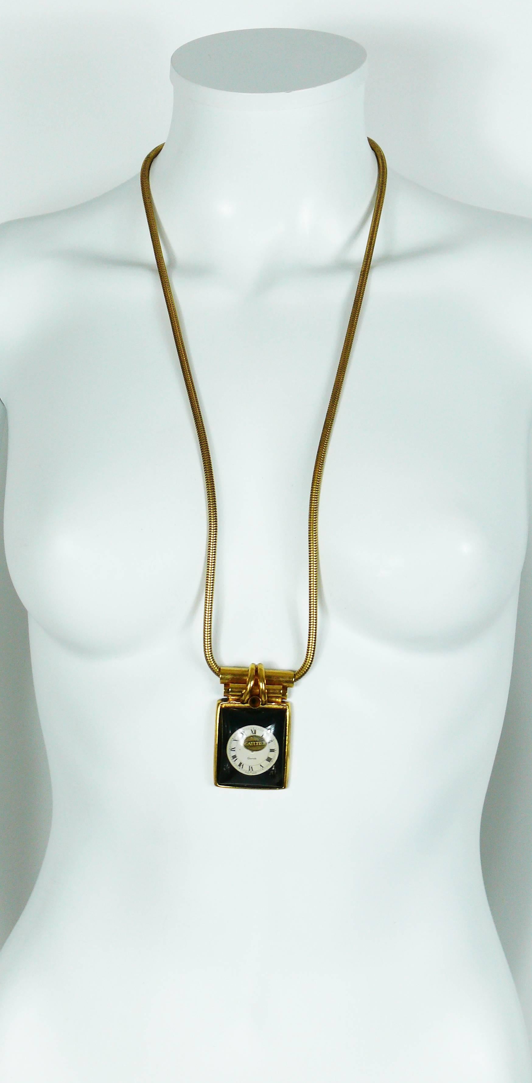 JEAN PAUL GAULTIER rare and collectable vintage steampunk watch pendant necklace.

Gold tone snake chain link featuring a rectangular watch dial in clear resin inlaid.

Marked GAULTIER.

Indicative measurements : total length approx. 80 cm (31.5