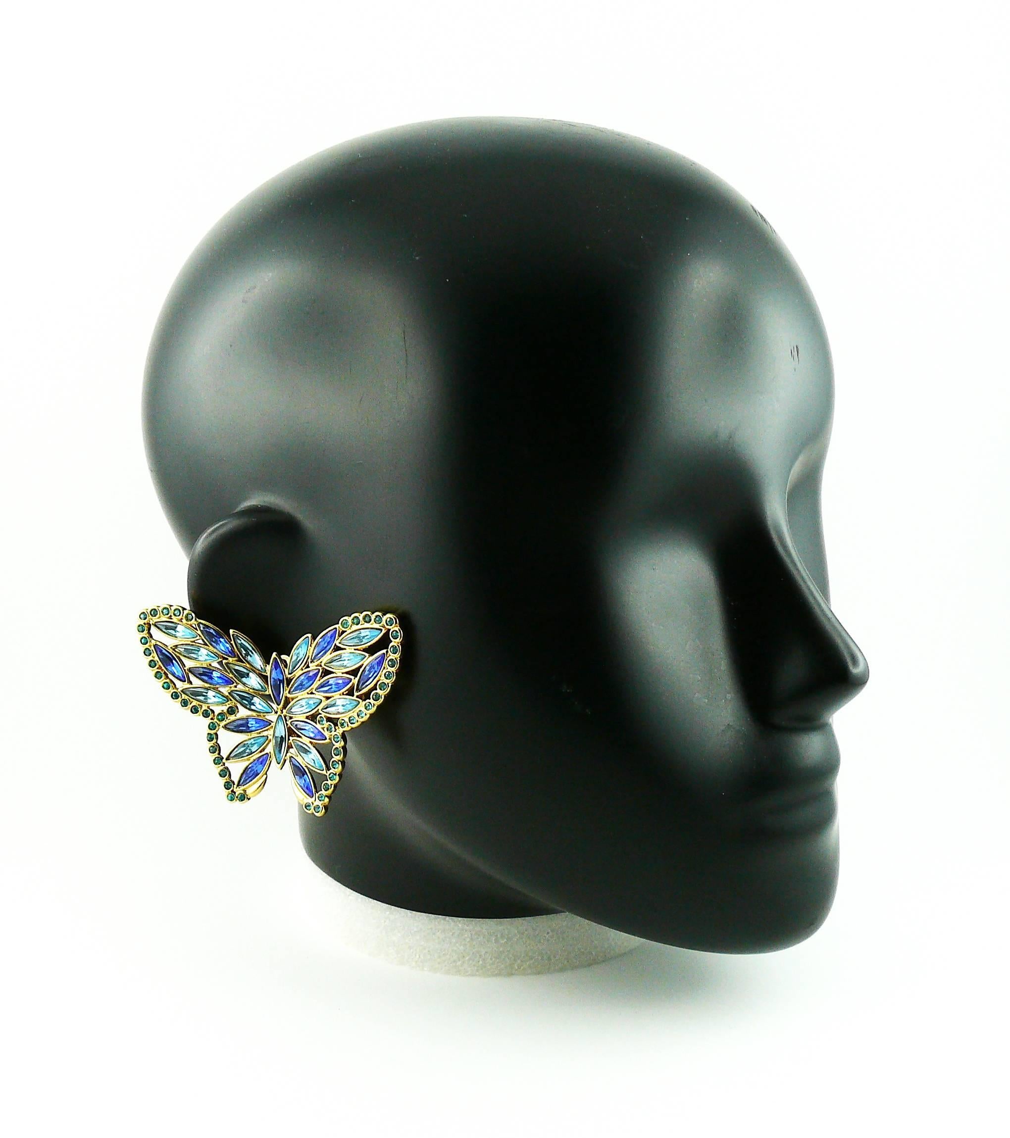 YVES SAINT LAURENT vintage massive openwork butterfly clip-on earrings with blue shade crystal embellishement.

Rare !

Marked YSL Made in France.

JEWELRY CONDITION CHART
- New or never worn : item is in pristine condition with no noticeable