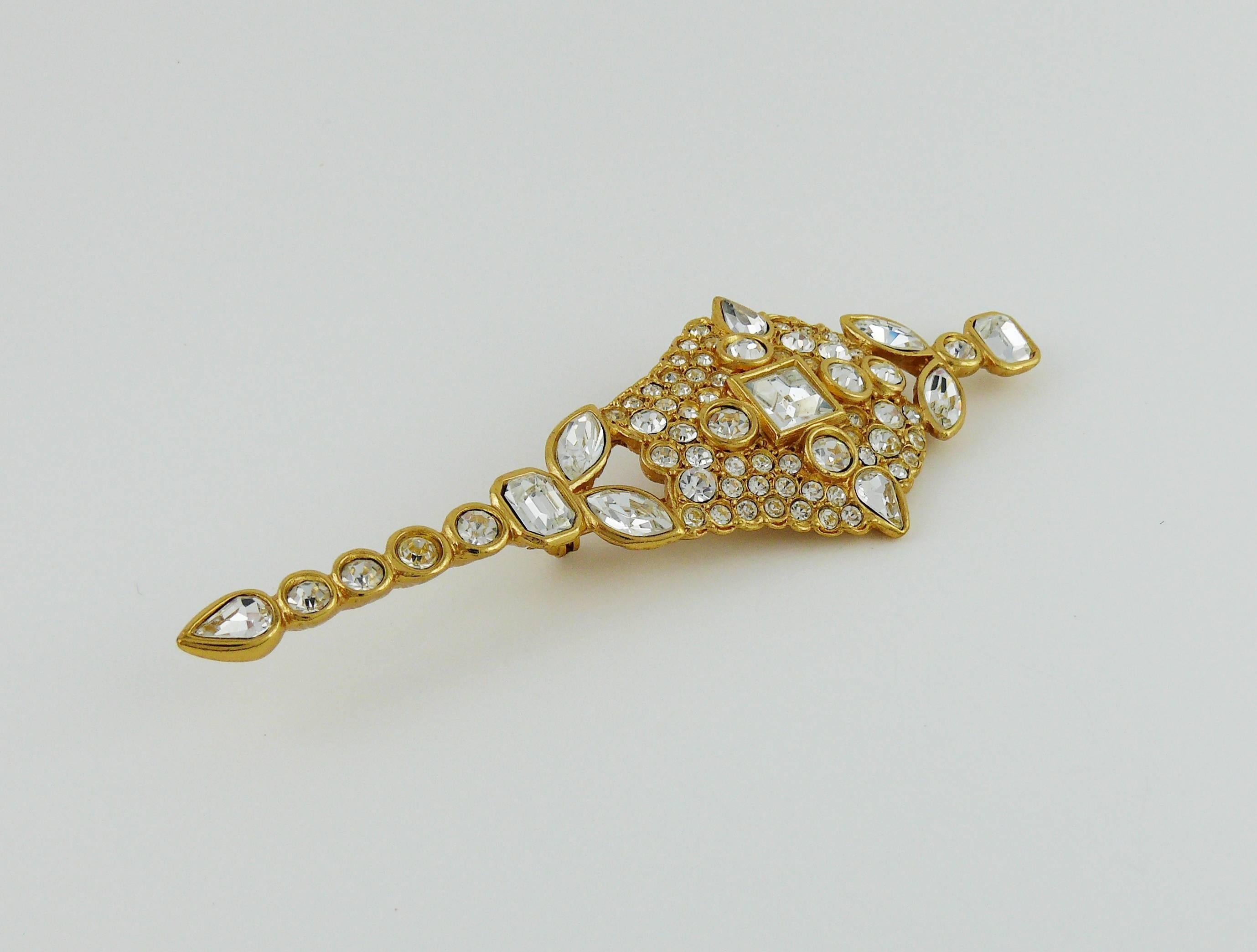 YVES SAINT LAURENT vintage massive gold tone diamante brooch.

Marked YSL Made in France.

JEWELRY CONDITION CHART
- New or never worn : item is in pristine condition with no noticeable imperfections
- Excellent : item has been used and may have not