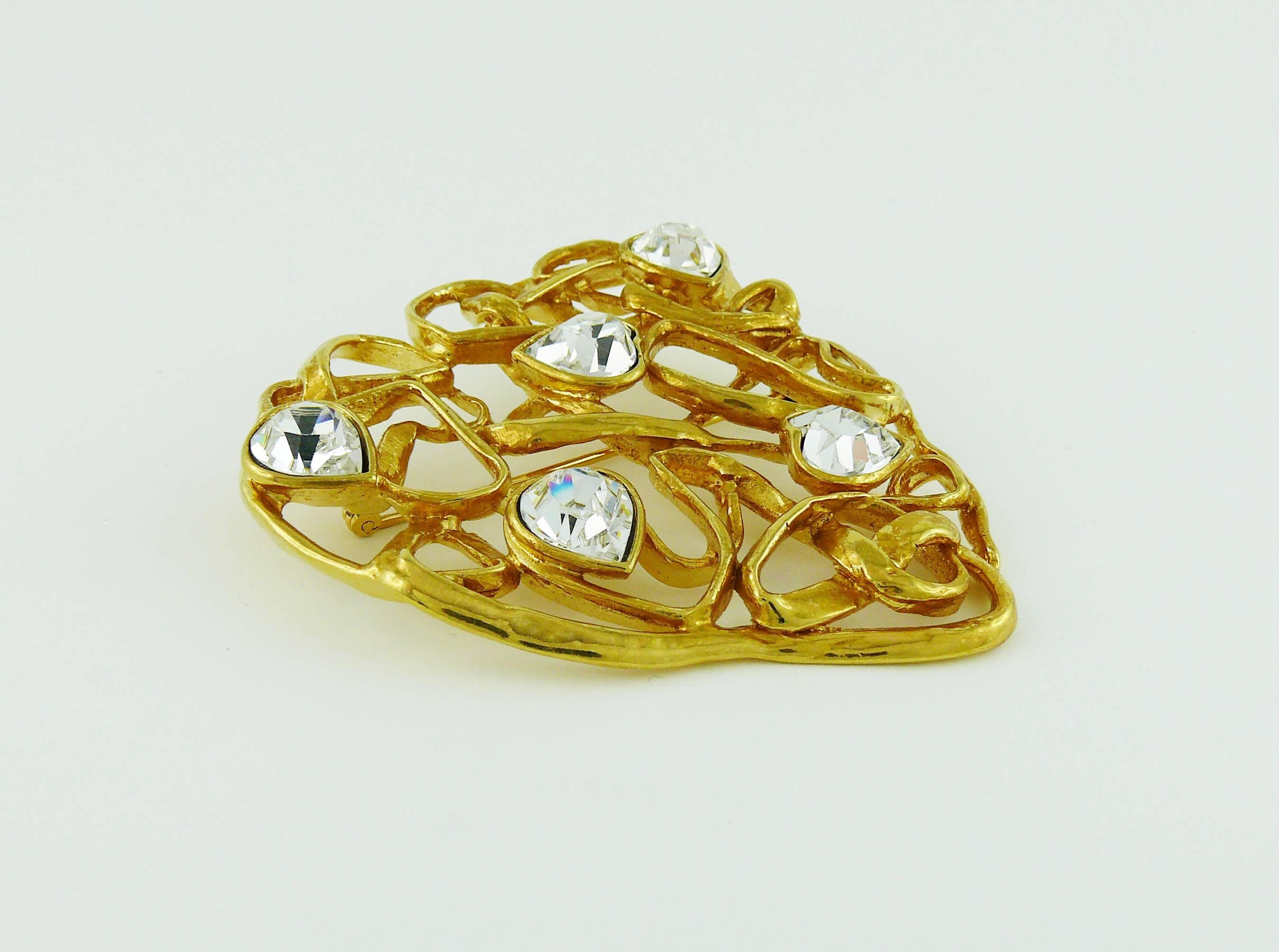 YVES SAINT LAURENT massive vintage wired gold tone heart brooch embellished with heart shaped clear crystals.

Marked YSL Made in France.

JEWELRY CONDITION CHART
- New or never worn : item is in pristine condition with no noticeable imperfections
-