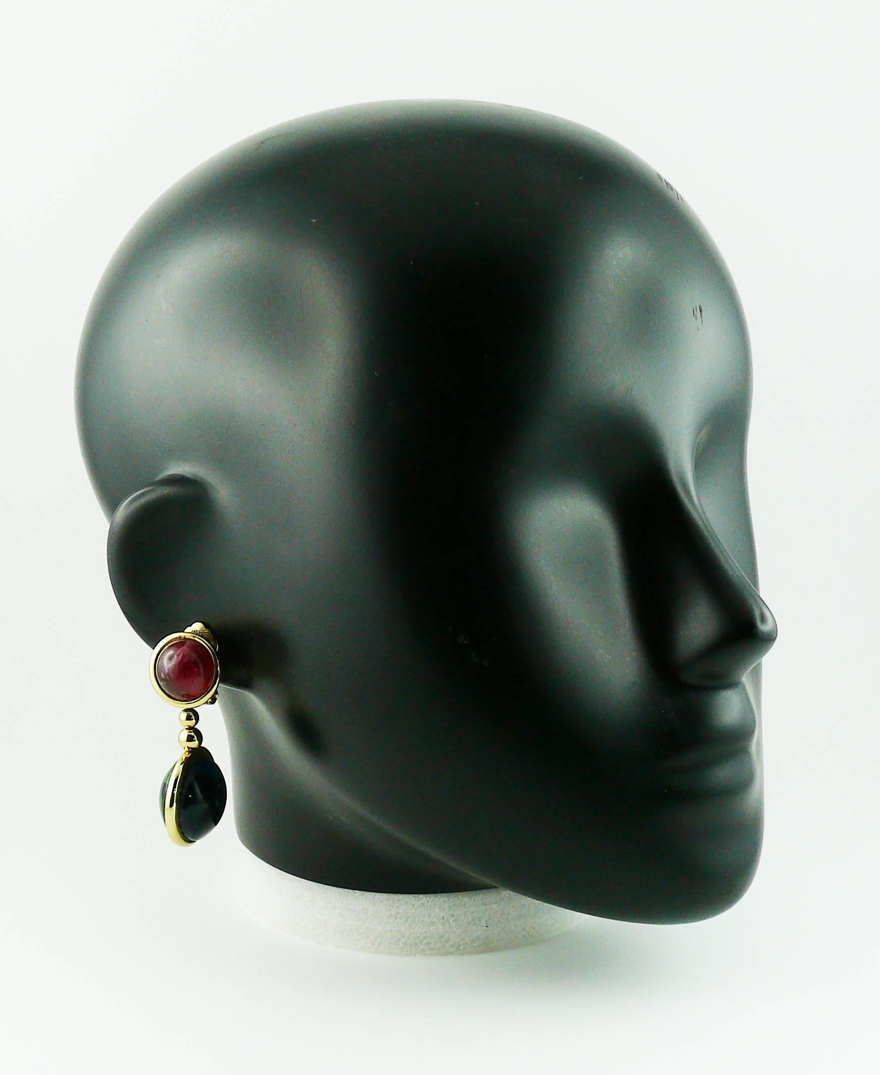 CHRISTIAN DIOR vintage gold toned dangling earrings (clip-on) embellished with multicolored faux gemstone GRIPOIX glass cabochons.

Marked CHR. DIOR Germany.

Indicative measurements : length approx. 5 cm (1.97 inches) / width approx. 2.4 cm
