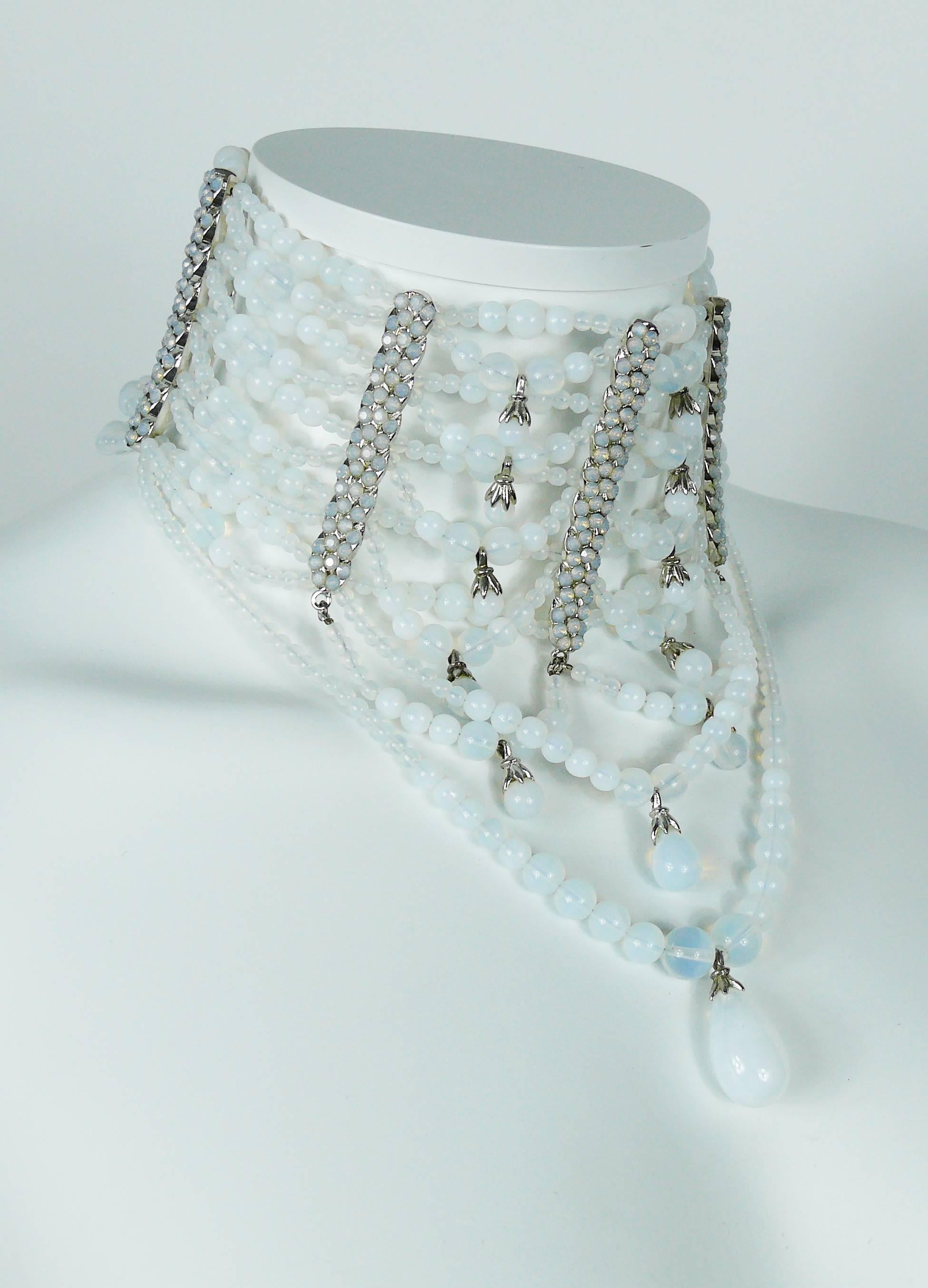 JOHN GALLIANO for CHRISTIAN DIOR rare opalescent drapery runway chocker necklace.

Created in the ateliers of parurier ROBERT GOOSSENS in the early 2000s.

Gorgeous draped design made of an array of faux moon rock beads in a silver tone