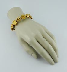 Chanel Vintage Interwoven Gold Toned Chain & Black Leather Coin Rigid Bracelet