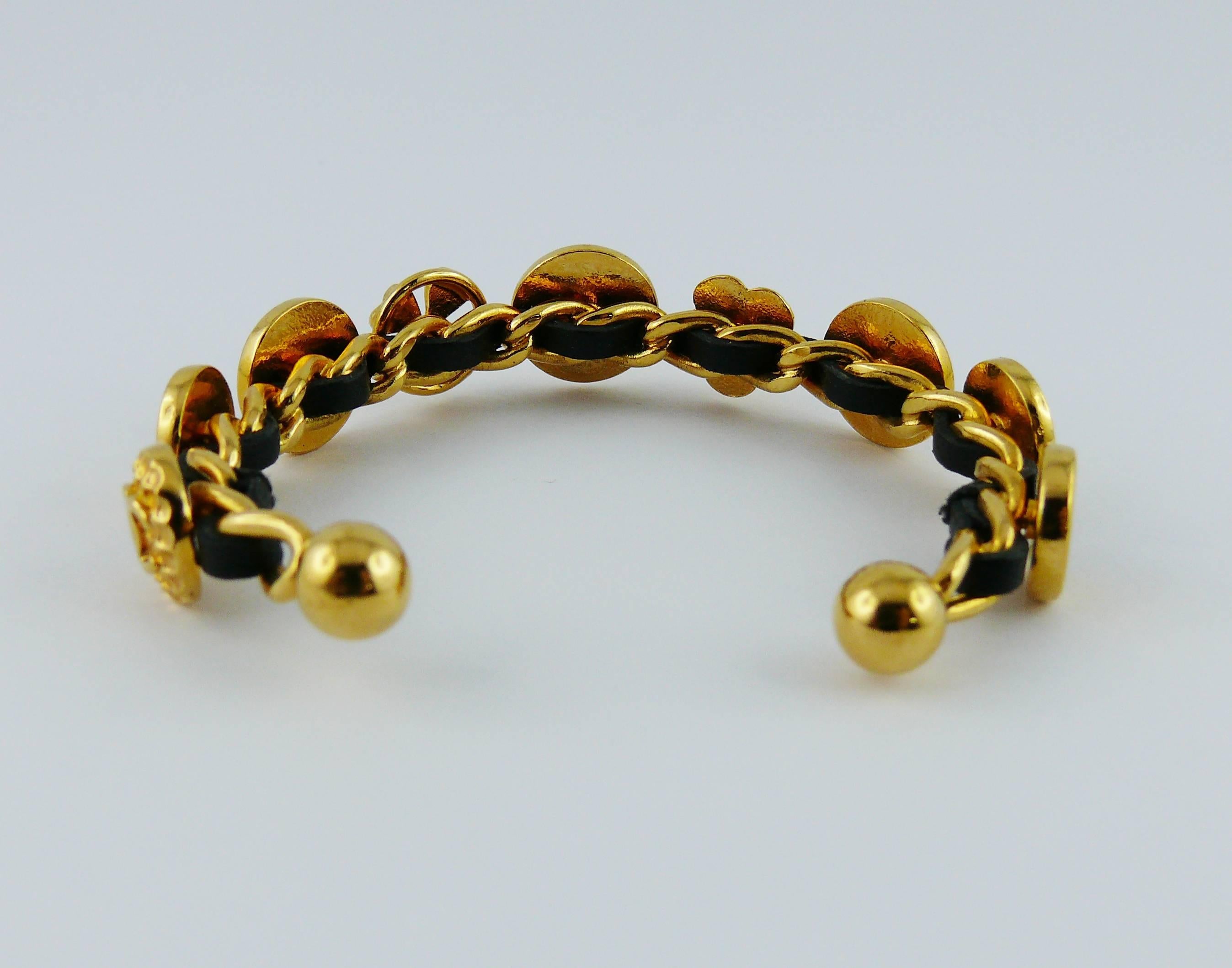 Women's Chanel Vintage Interwoven Gold Toned Chain & Black Leather Coin Rigid Bracelet For Sale