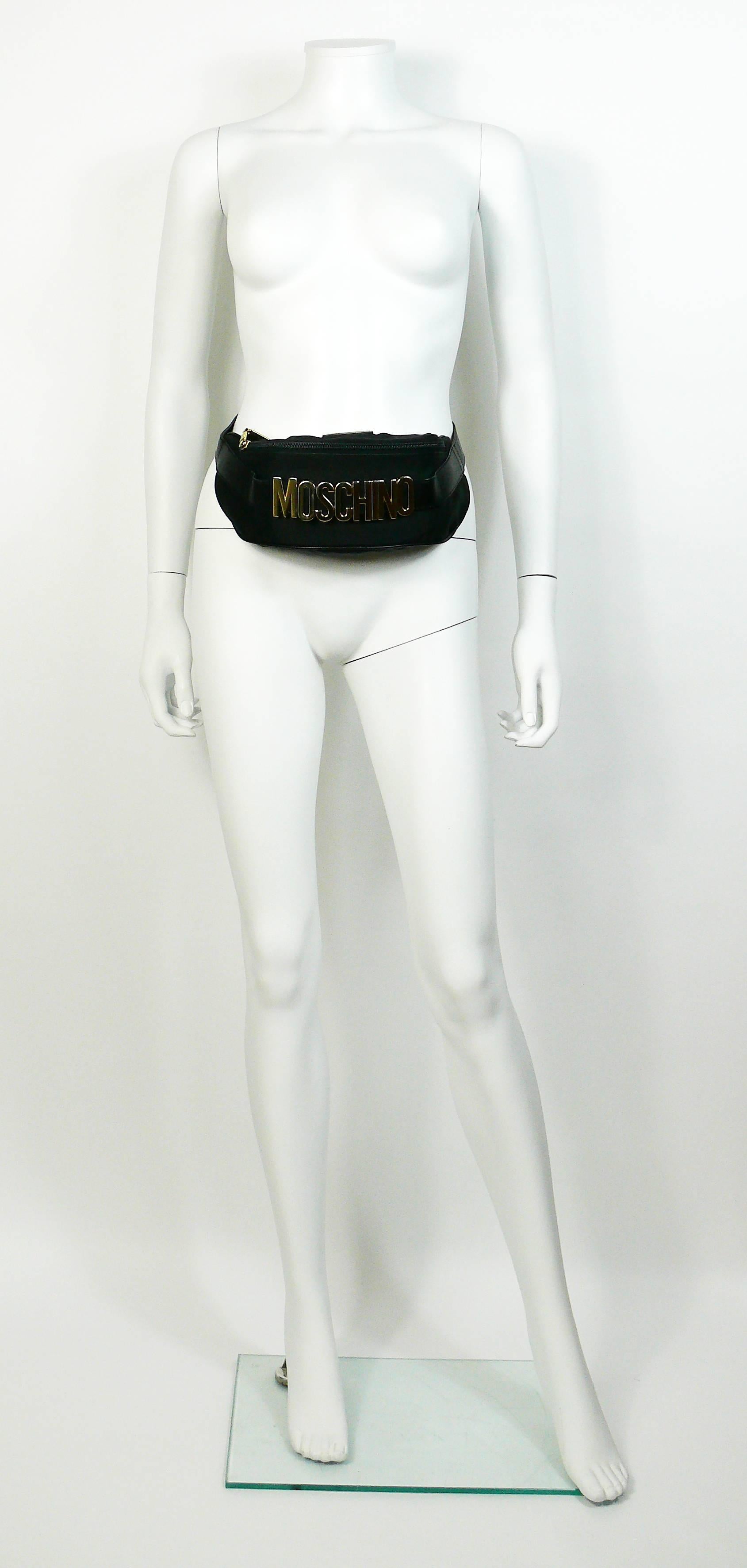 MOSCHINO by REDWALL vintage black fanny pack.

Thick nylon with leather strap and gold tone hardware.

One size fits all.
Adjustable leather straps.

Embossed Centropercento MOSCHINO Redwall Made in Italy.
Numbered model 461002.
Redwall logo