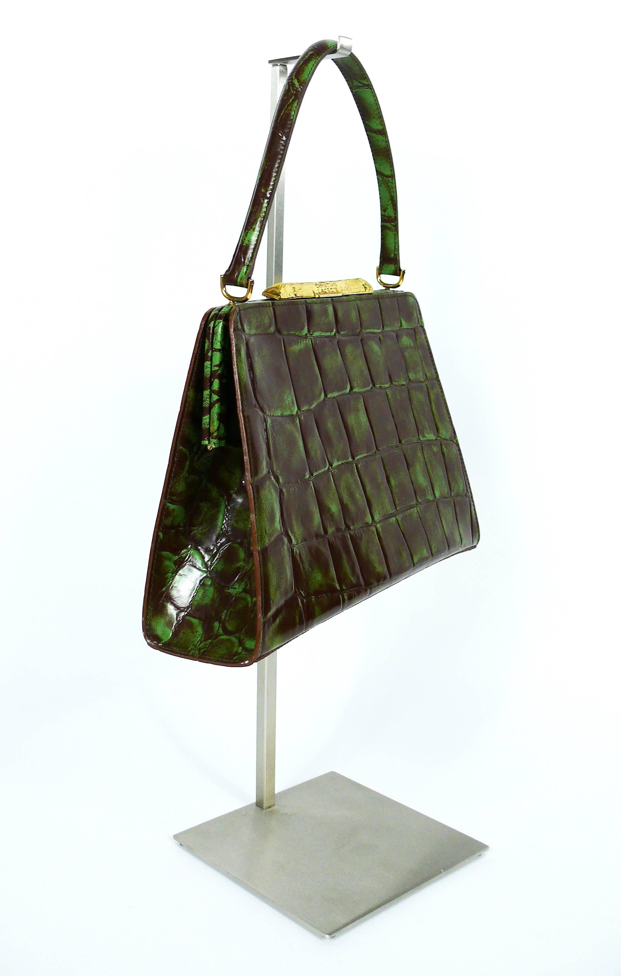 CHRISTIAN LACROIX vintage rare faux leather croc embossed framed handbag in vibrant green and brown colors.

This bag features :
- Gold toned hardware.
- Gorgeous gold toned textured clasp embossed CHRISTIAN LACROIX CL.
- Yellow canvas