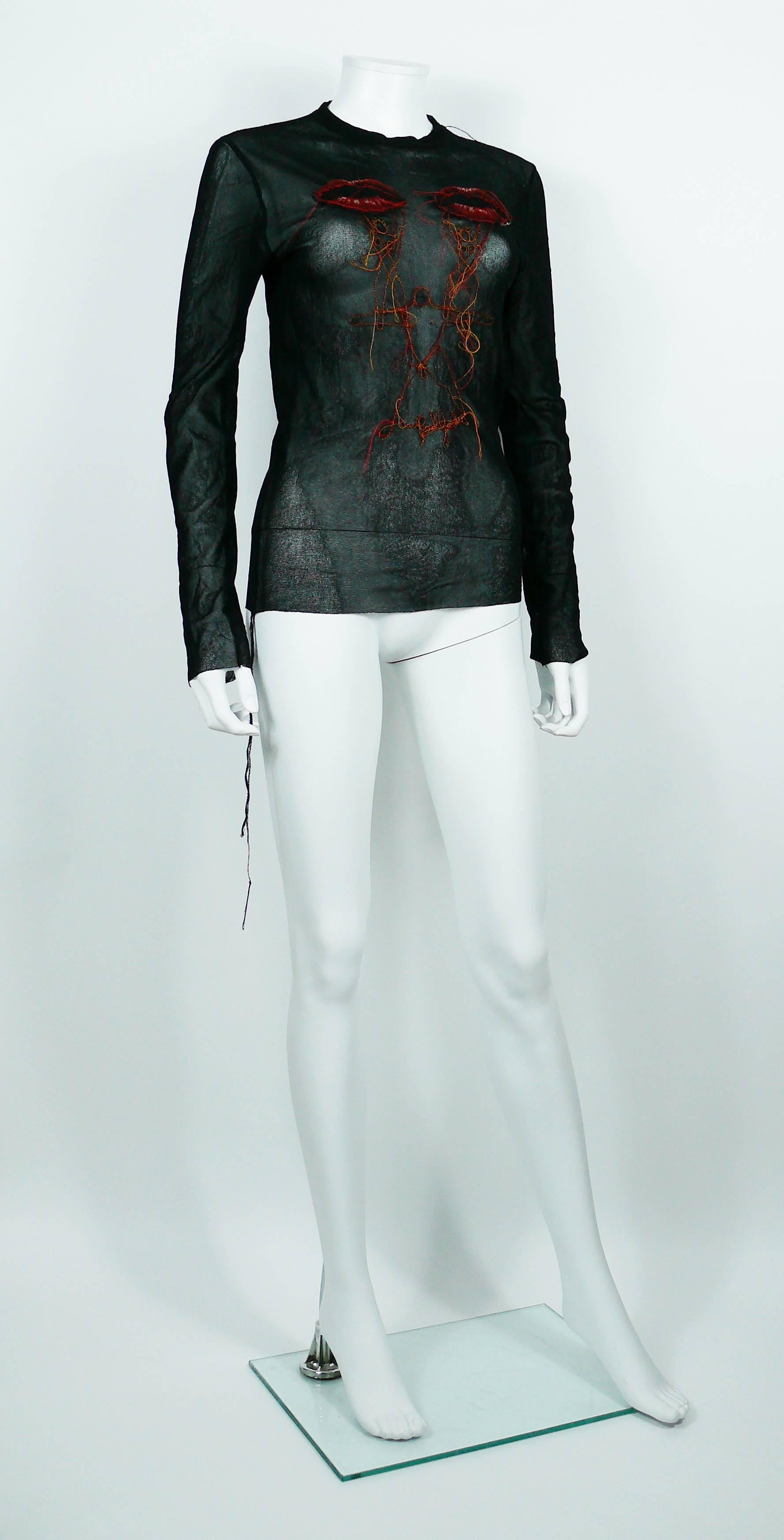 JEAN PAUL GAULTIER vintage Maille Homme black mesh top with mouth appliques.

This stretchy sheer mesh nylon top is embroidered with red and yellow women and man.

Exposed knit seams.

Label reads Jean Paul Gaultier Maille Homme Made in