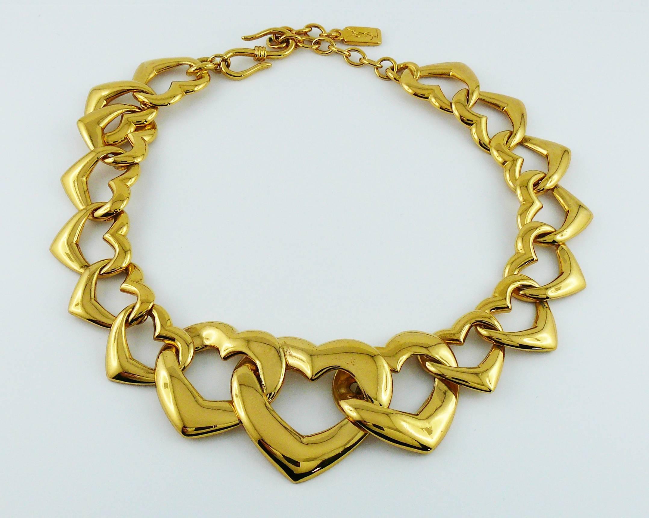 YVES SAINT LAURENT vintage gold toned necklace and bracelet set featuring hearts.

Marked YSL Made in France.

NECKLACE indicative measurements : max. length approx. 49 cm (19.29 inches) / adjustable length from approx 43 cm (16.93 inches) to