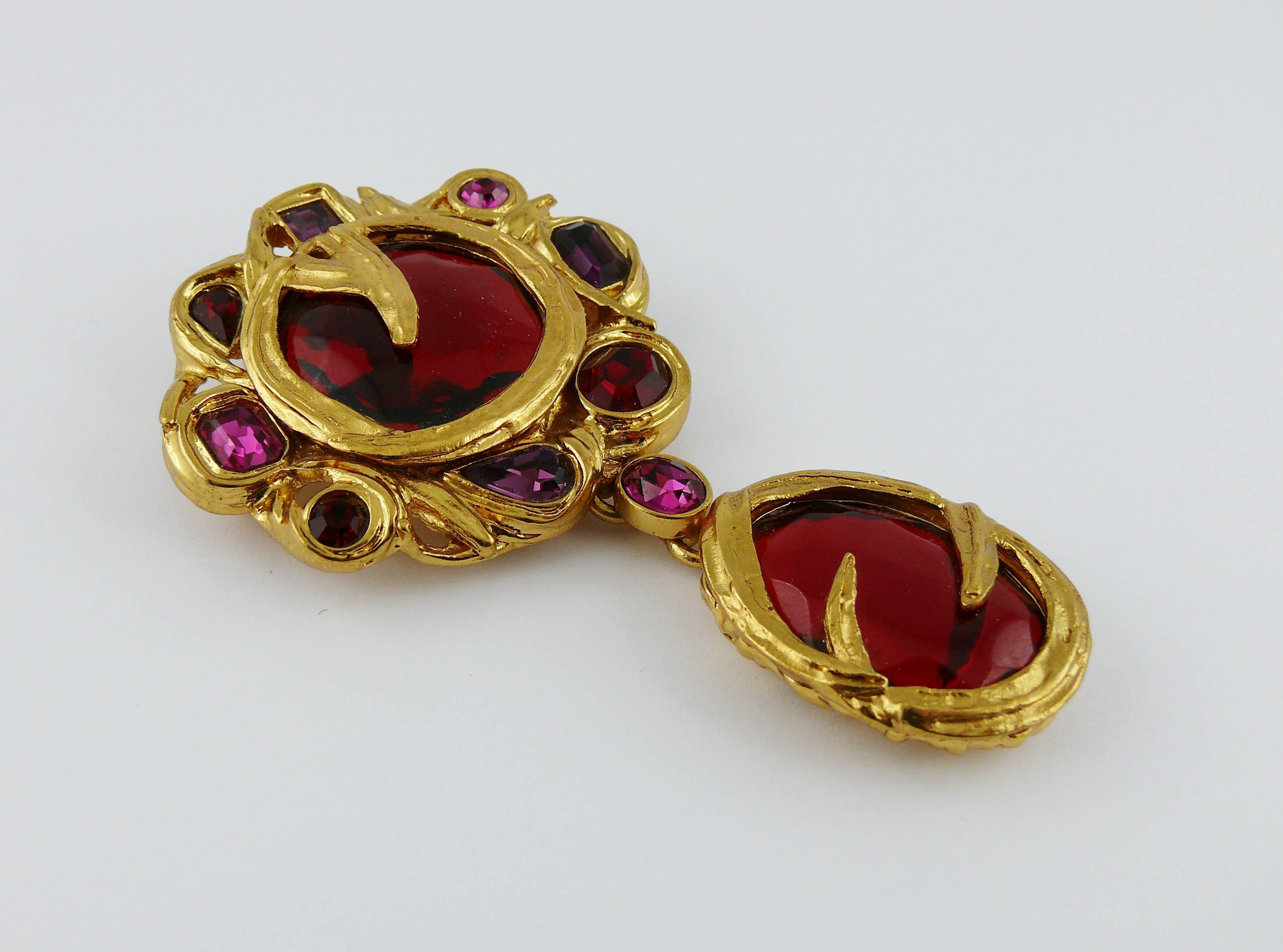 YVES SAINT LAURENT vintage massive brooch featuring multicolored resin cabochons and crystals in a gold toned setting.

Can be worn as a pendant.

Embossed YSL Made in France.

Indicative measurements : length approx. 9.4 cm (3.70 inches) / max.