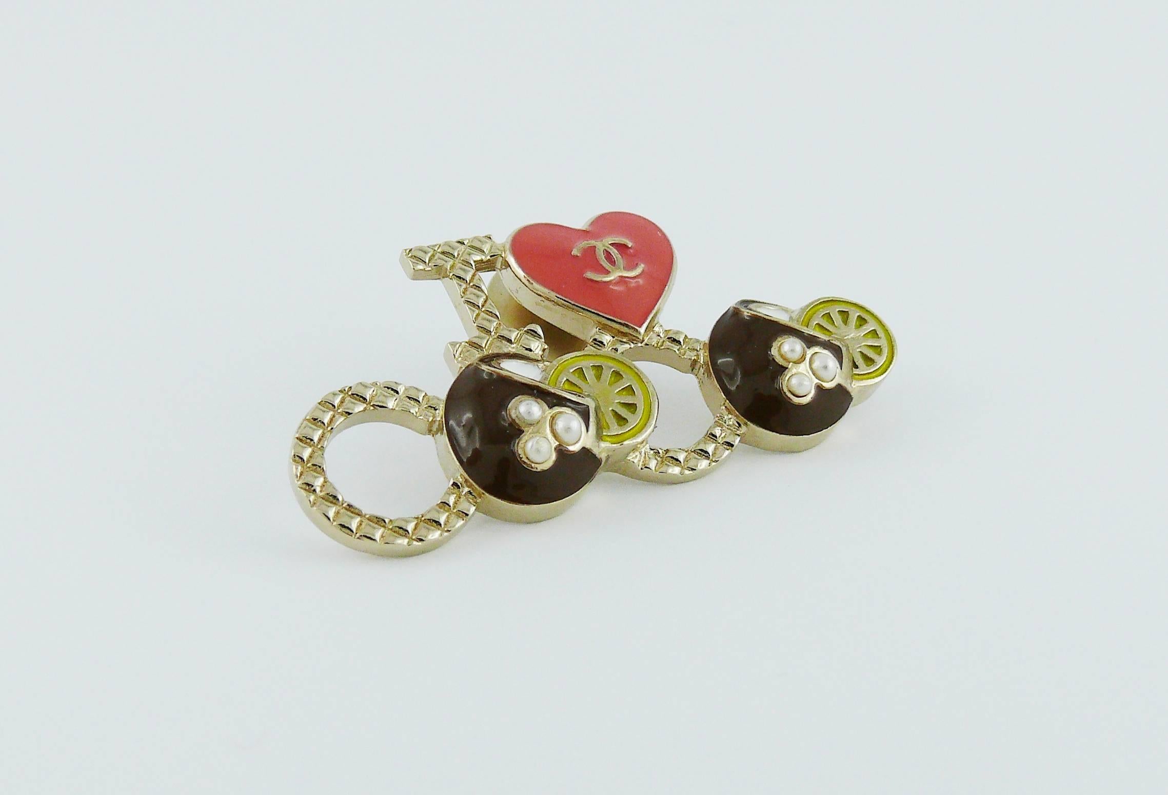 CHANEL "I Love Coco" CC brooch featuring multicolored enamel and faux pearls.

Laser stamping CHANEL G17 C Made in Italy.

Indicative measurements : length approx. 4.2 cm (1.65 inches) / height approx. 2.1 cm (0.83 inch).

Comes with