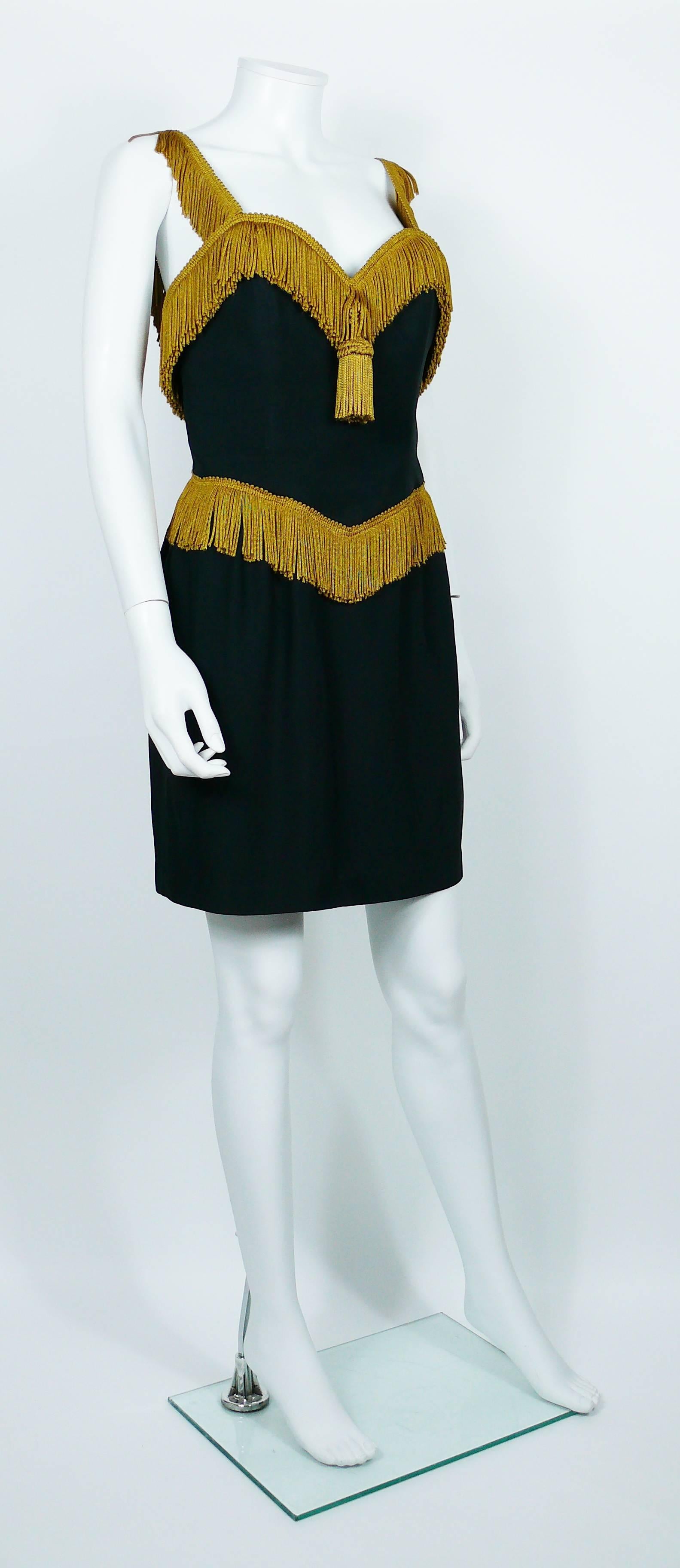MOSCHINO COUTURE vintage black cocktail dress featuring passementerie details and a large tassel.

Spaghetti straps.
Back zip.

Label reads MOSCHINO COUTURE.

Size tag reads : I 44 / D 40 / F 40 / GB 12 / USA 10
Please check