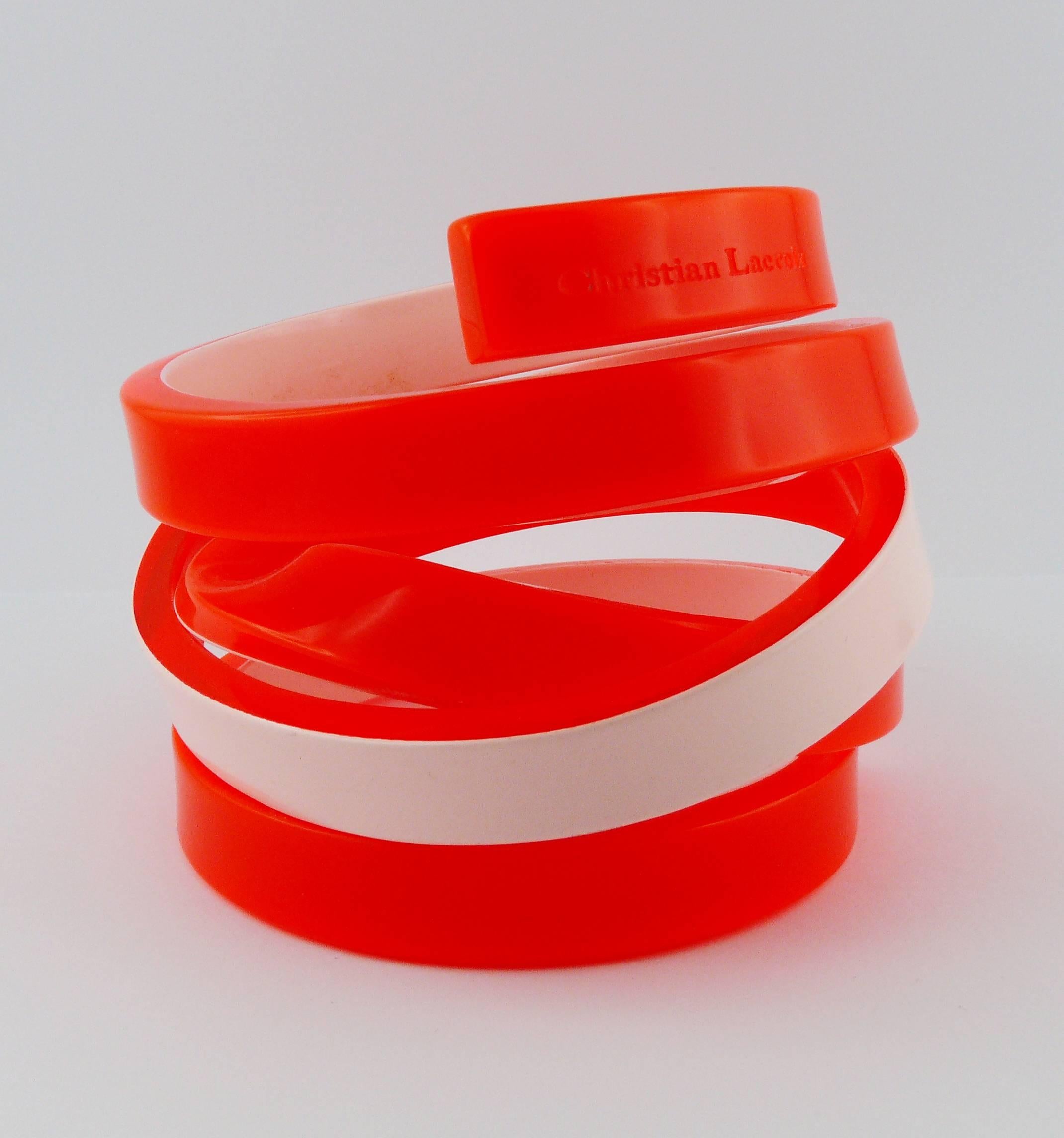 CHRISTIAN LACROIX neon orange resin sculptural cuff bracelet.

Runway model - Spring 2008 Ready-to-Wear Runway show.

Embossed CHRISTIAN LACROIX and Made in France.

Indicative measurements : max. height approx. 8 cm (3.15 inches).

JEWELRY
