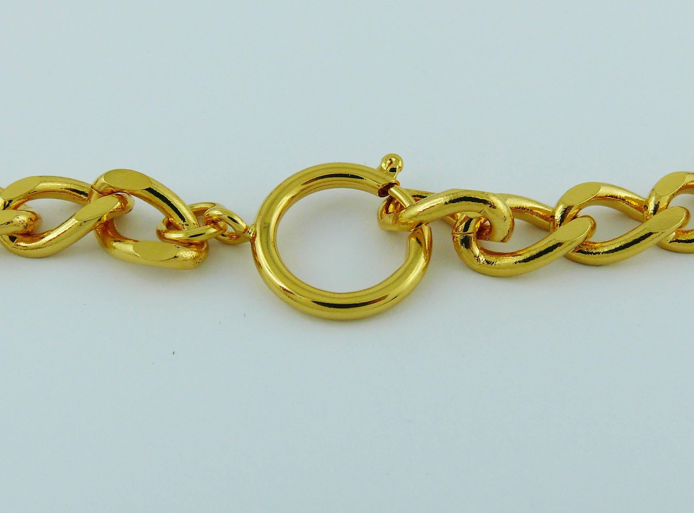 Yves Saint Laurent Vintage Gold Toned Iconic Multi Charm Necklace 1