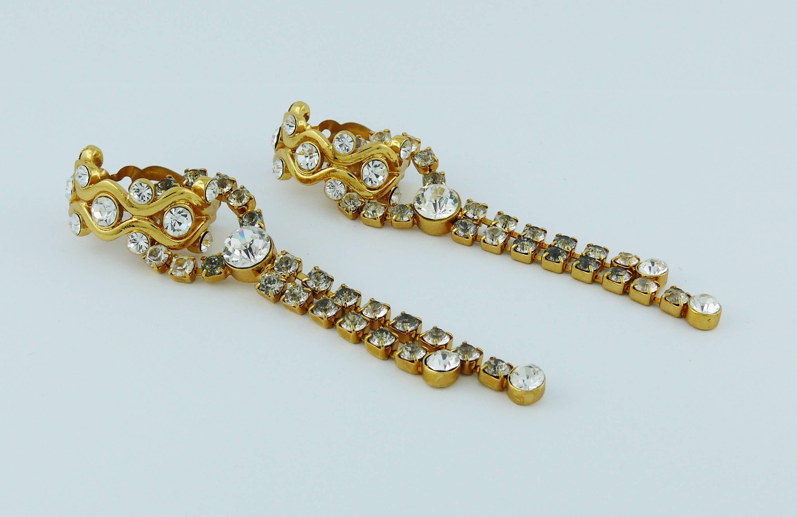 YVES SAINT LAURENT vintage gold toned two-way dangling earrings (clip-on) embellished with clear crystals.

Embossed YSL Made in France.

Indicative measurements : max. length approx. 9.5 cm (3.74 inches) / max. width approx. 2 cm (0.79