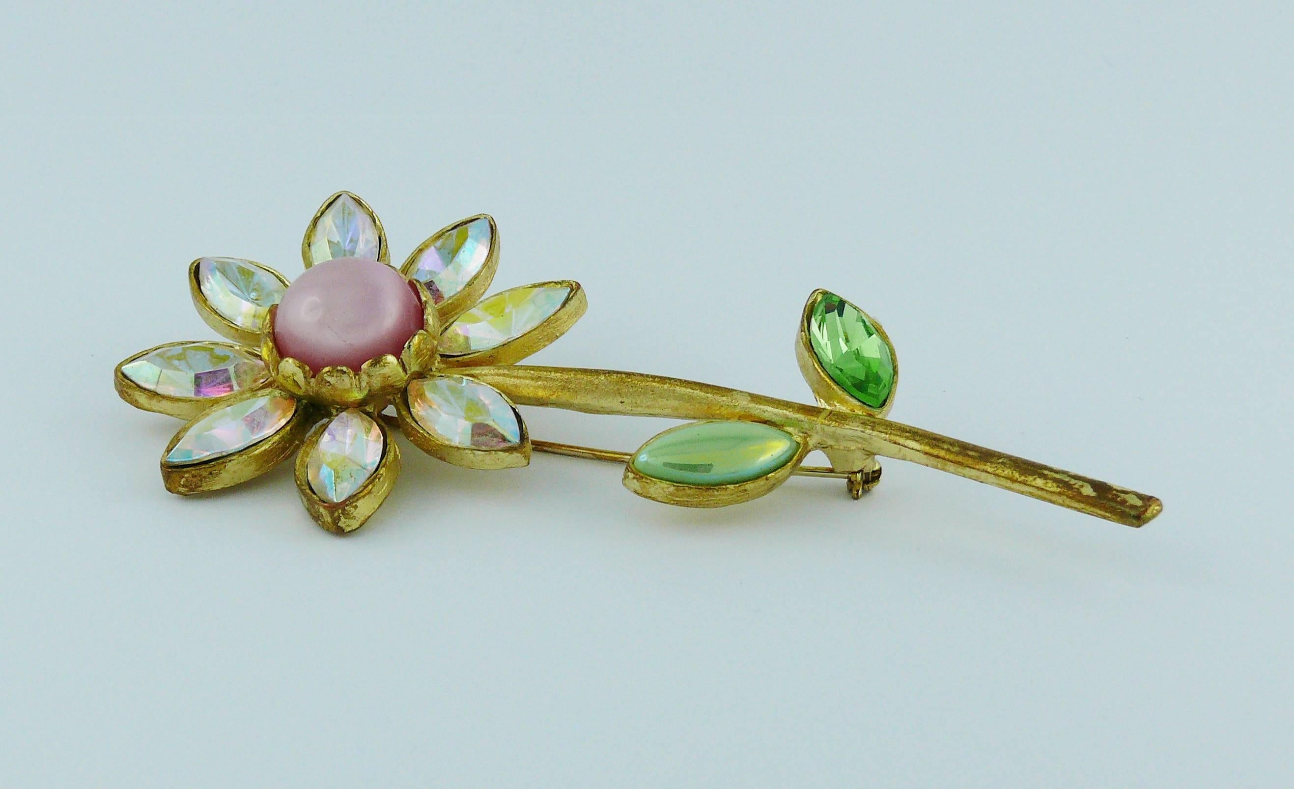 CHRISTIAN LACROIX vintage flower brooch embellished with crystals and glass cabochons.

Marked CHRISTIAN LACROIX CL Made in France.

Indicative measurements : height approx. 9.4 cm (3.70 inches) / max. width approx. 4.4 cm (1.73 inches).

JEWELRY