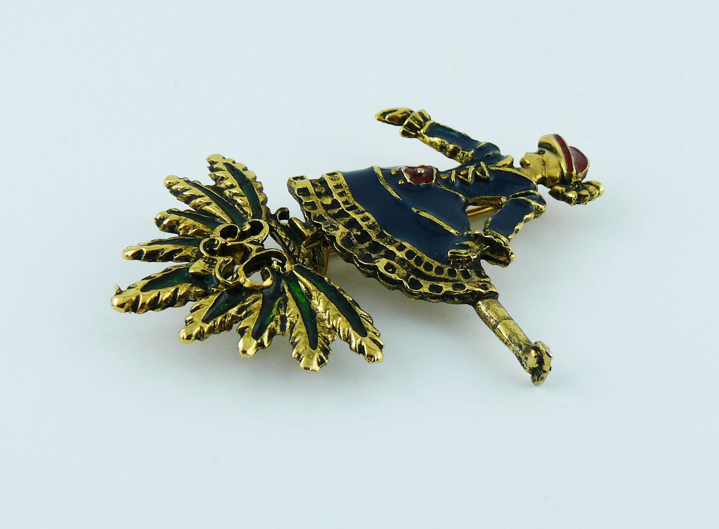 HERMES Paris gold toned with antique patina enamel ice skater brooch.

Embossed HERMES Parfums.

Indicative measurements : height approx. 6.3 cm (2.48 inches) / max. width approx. 3.7 cm (1.46 inches).

JEWELRY CONDITION CHART
- New or never worn :