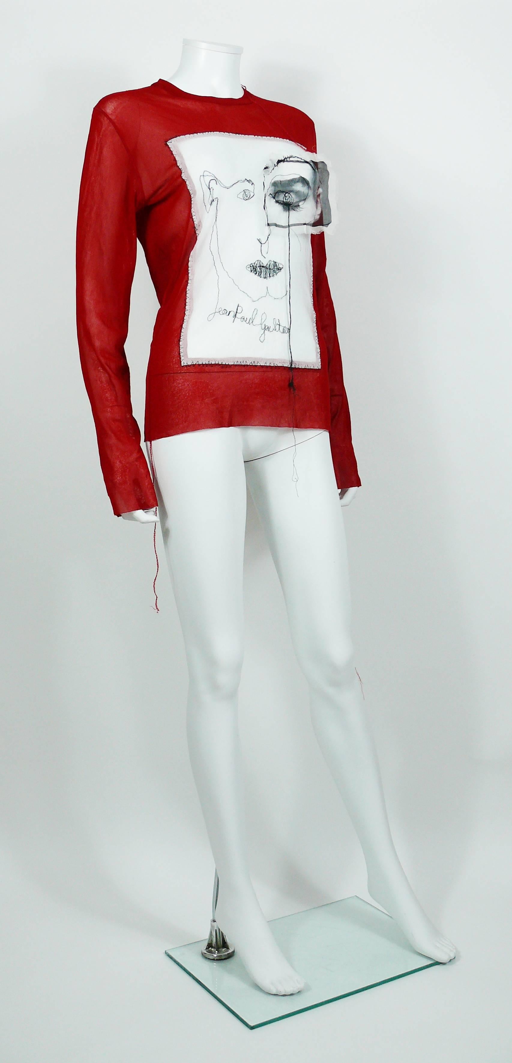 JEAN PAUL GAULTIER men's red sheer mesh top with embroidered portrait and eye applique.

This stretchy mesh nylon top is embroidered with black JEAN PAUL GAULTIER cursive signature.

Label reads JEAN PAUL GAULTIER Maille Homme Made in