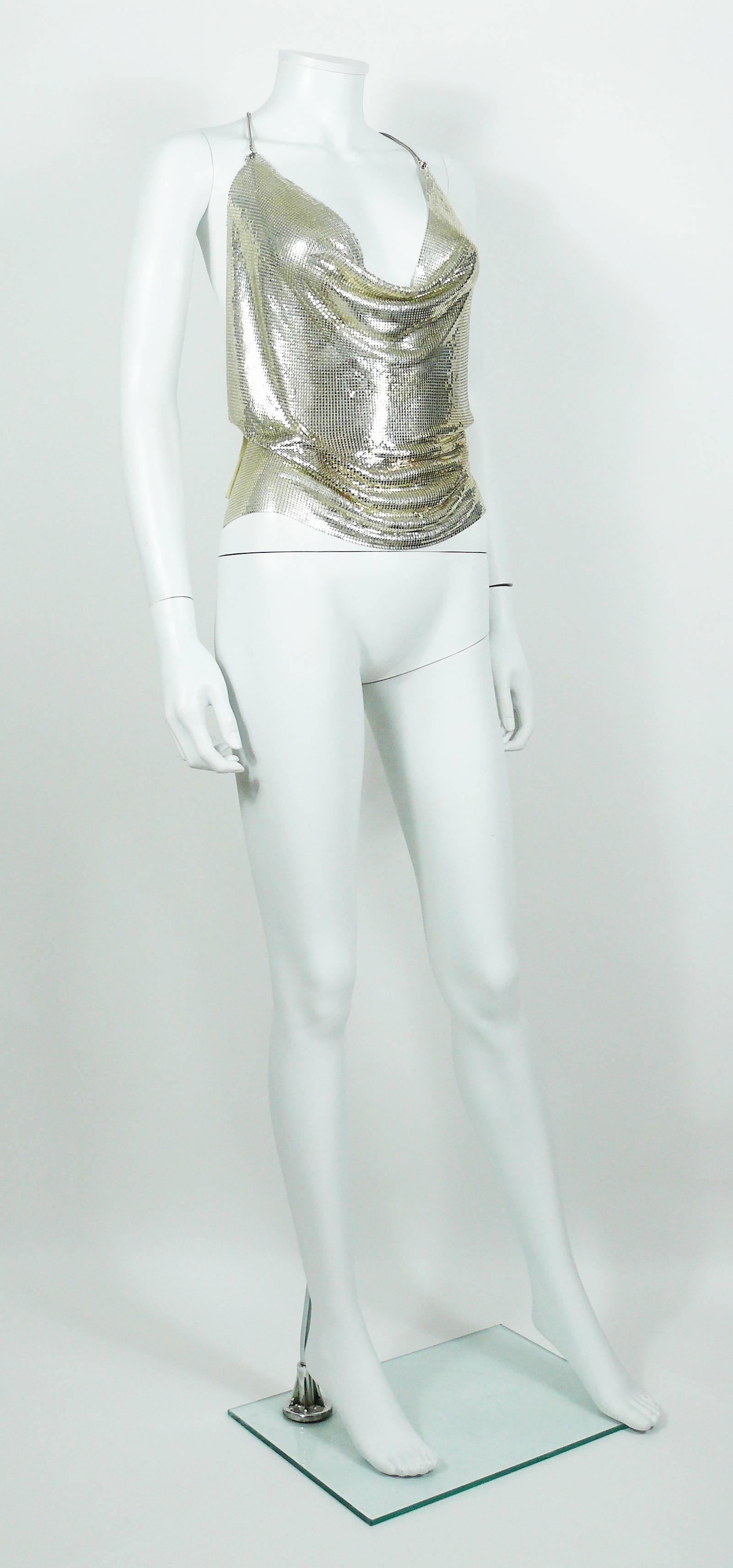 PACO RABANNE vintage polished silver tone metal mesh backless with draped front top.

Probably never worn (original tag attached).

Metal tag PACO RABANNE Paris.
Made in France.

Size tag reads : S.

CLOTHES CONDITION CHART
- New or never worn :