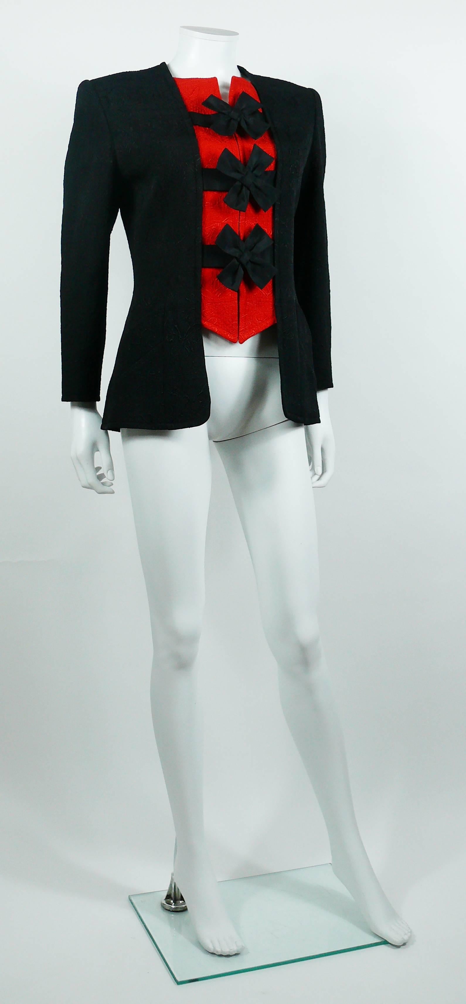 CHRISTIAN LACROIX vintage Provençal 18th Century inspired black and red jacket.

This jacket features :
- Provençal quilts inspired black and red textile.
- 3 black ribbons on front.
- Long sleeves.
- Padded shoulders.
- 2 front pockets.
- Zipper