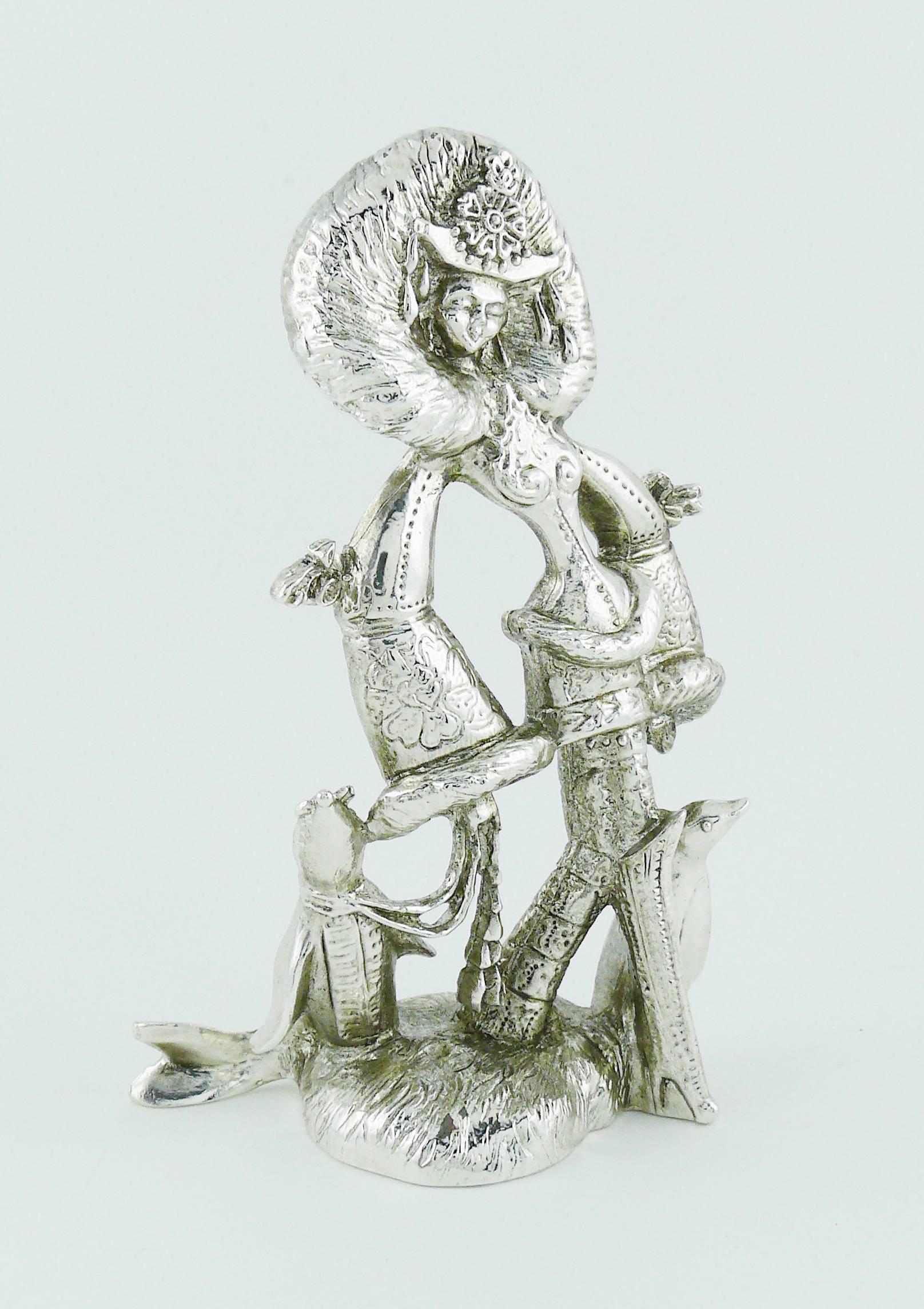 CHRISTIAN LACROIX vintage rare silver toned paperweight statue featuring a possible allegory of the Antarctica continent.

Collector item.

Embossed CHRISTIAN LACROIX France.
Maker's hallmarks.

Indicative measurements : height approx. 12.4 cm (4.88