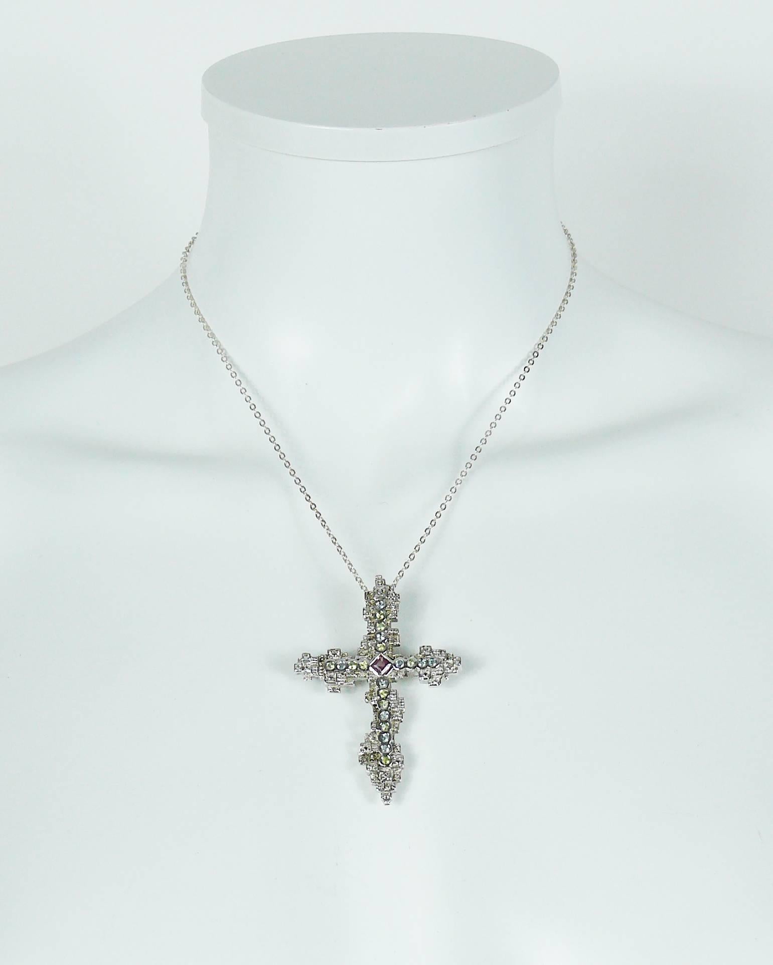 CHRISTIAN LACROIX sterling silver cross pendant embellished with multicolored crystals.

Can be worn as a brooch.

Sterling silver chain.
Spring clasp closure.

French silver hallmark "Minerve" head (on the reverse of the cross).
Stamped