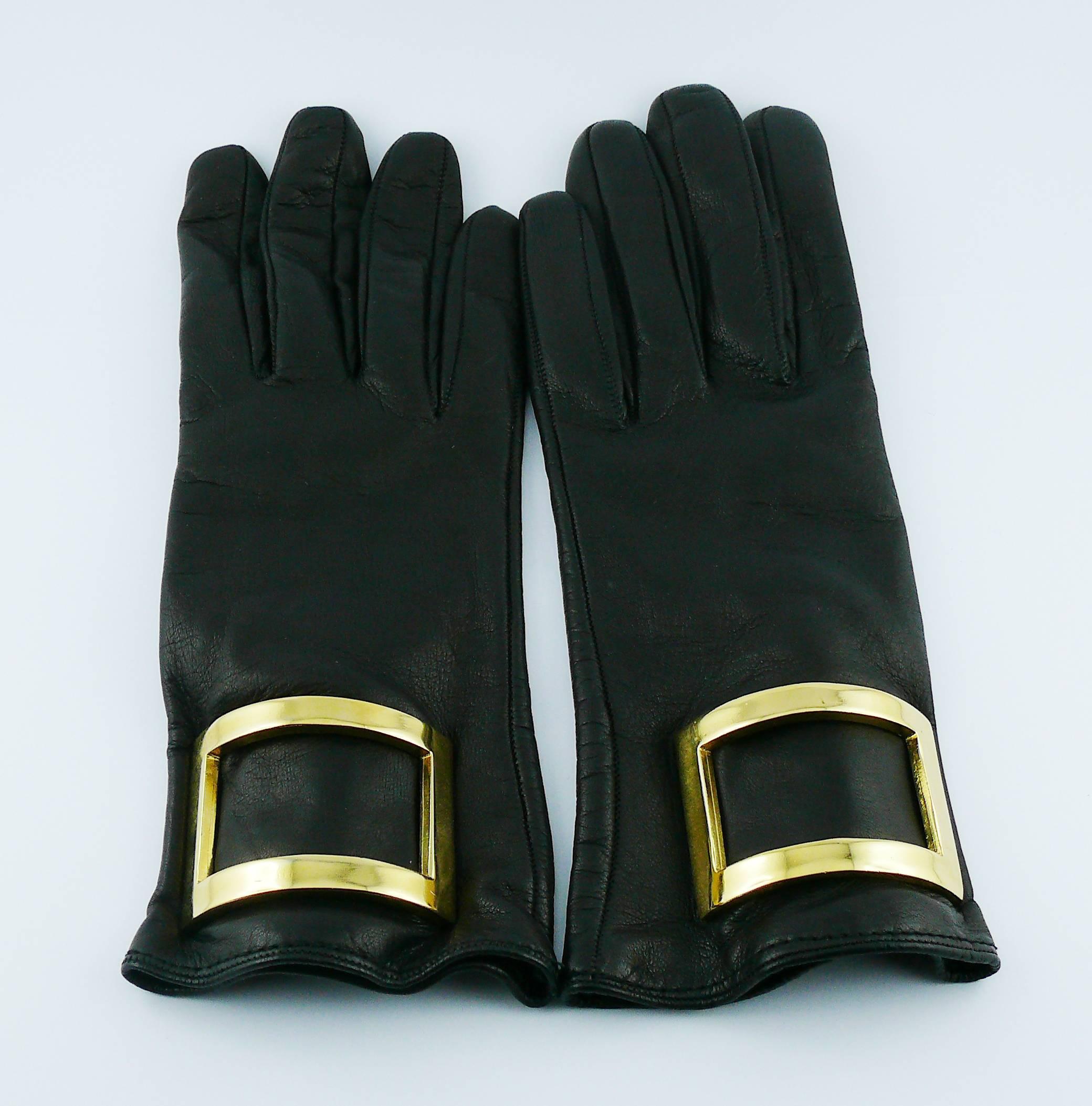 GIANFRANCO FERRE vintage black leather gloves featuring a large gold toned faux buckle detail.

Label reads GIANFRANCO FERRE Made in Italy.

Size tag reads : S.

No composition tag.

Comes with original box (very used).

NOTES
- This is a preloved