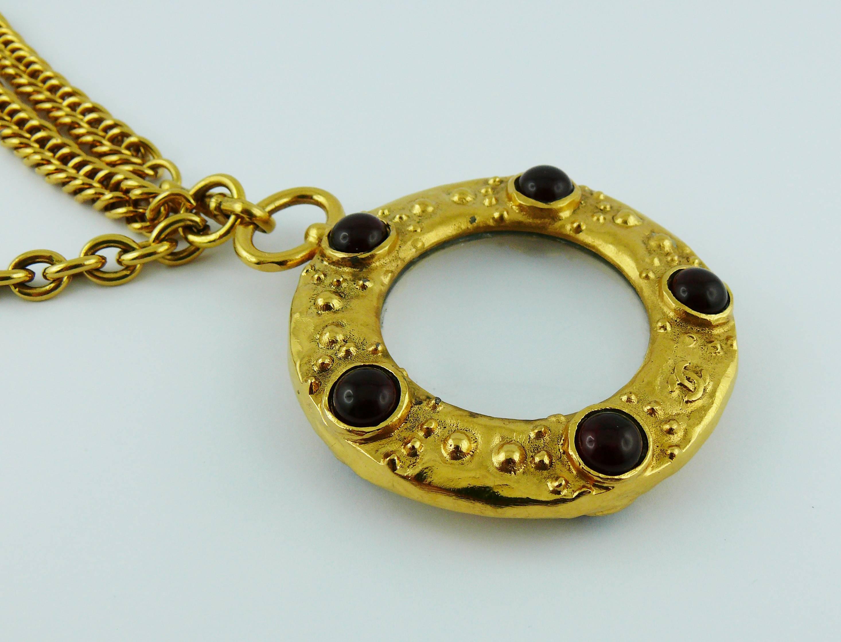 Women's Chanel Vintage Gold Toned and Ruby Gripoix Magnifying Glass Pendant Necklace