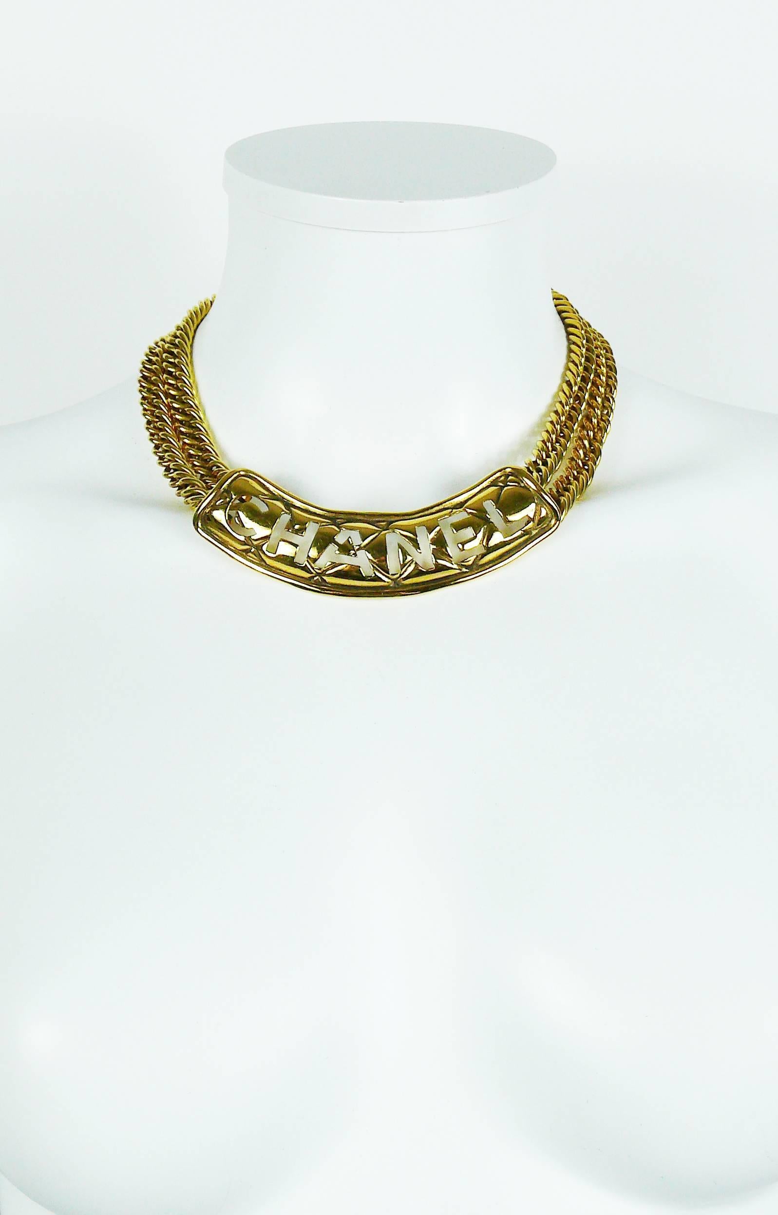 CHANEL vintage rare iconic gold toned choker necklace featuring a quilted cut out "C H A N E L" ID tag and a double chunky curb chain.

Spring clasp closure.

Marked CHANEL Made in France.
Numbered 3795.

Indicative measurements : length