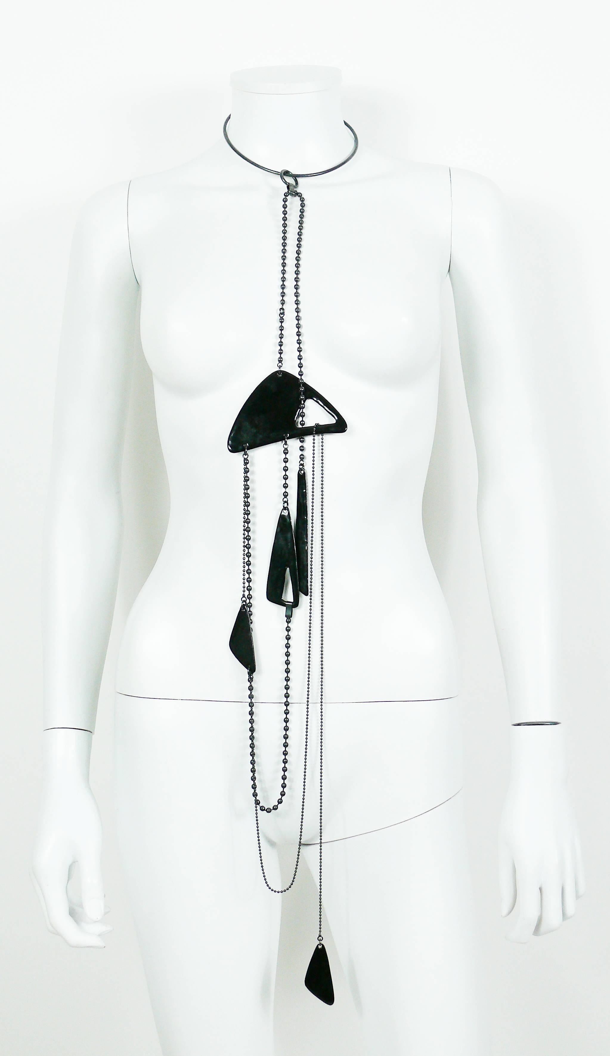 JEAN PAUL GAULTIER hanging mobile sautoir necklace featuring a gun patina metal collar, multiple chains and black enamel abstract elements.

Mobile section suspends to the collar with a ring (as shown on picture 2).

Marked GAULTIER on several