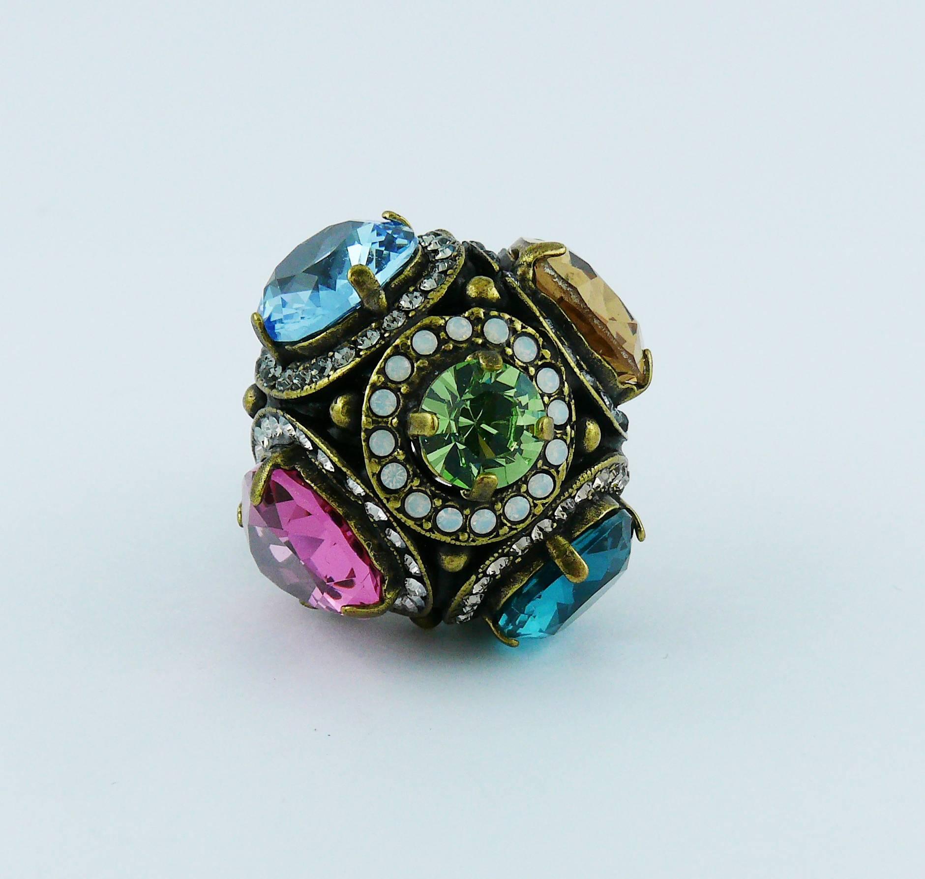 LANVIN dome ring featuring multicolored crystals in a bronze tone setting.

Embossed LANVIN.

Indicative measurements : inner circumference approx. 5.34 cm (2.10 inches).

JEWELRY CONDITION CHART
- New or never worn : item is in pristine condition