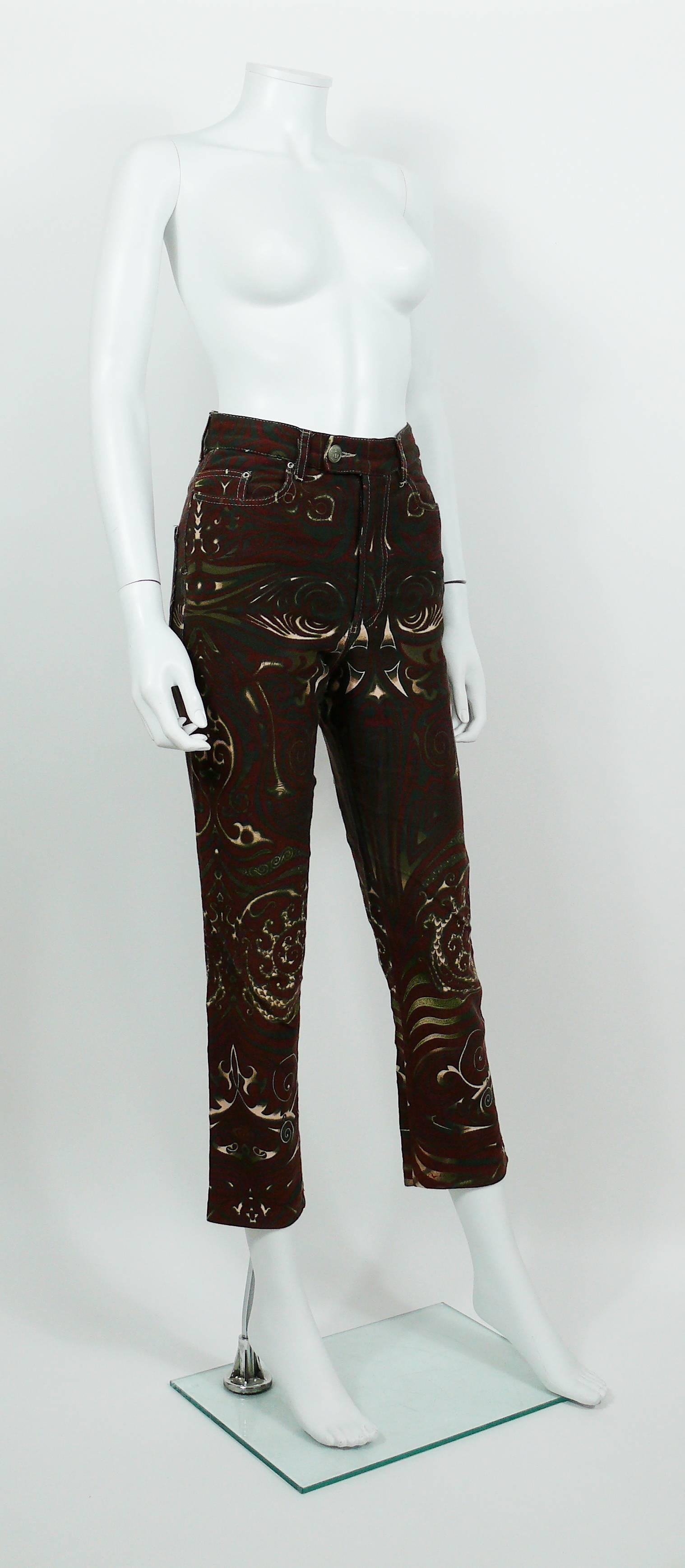 JEAN PAUL GAULTIER vintage rare pants trousers featuring an opulent Aboriginal Maori tattoo print.

These trousers feature :
- Stretchy material.
- Front buttoning and zip.
- Front and back pockets.
- Belt loops and signature brand loop at the