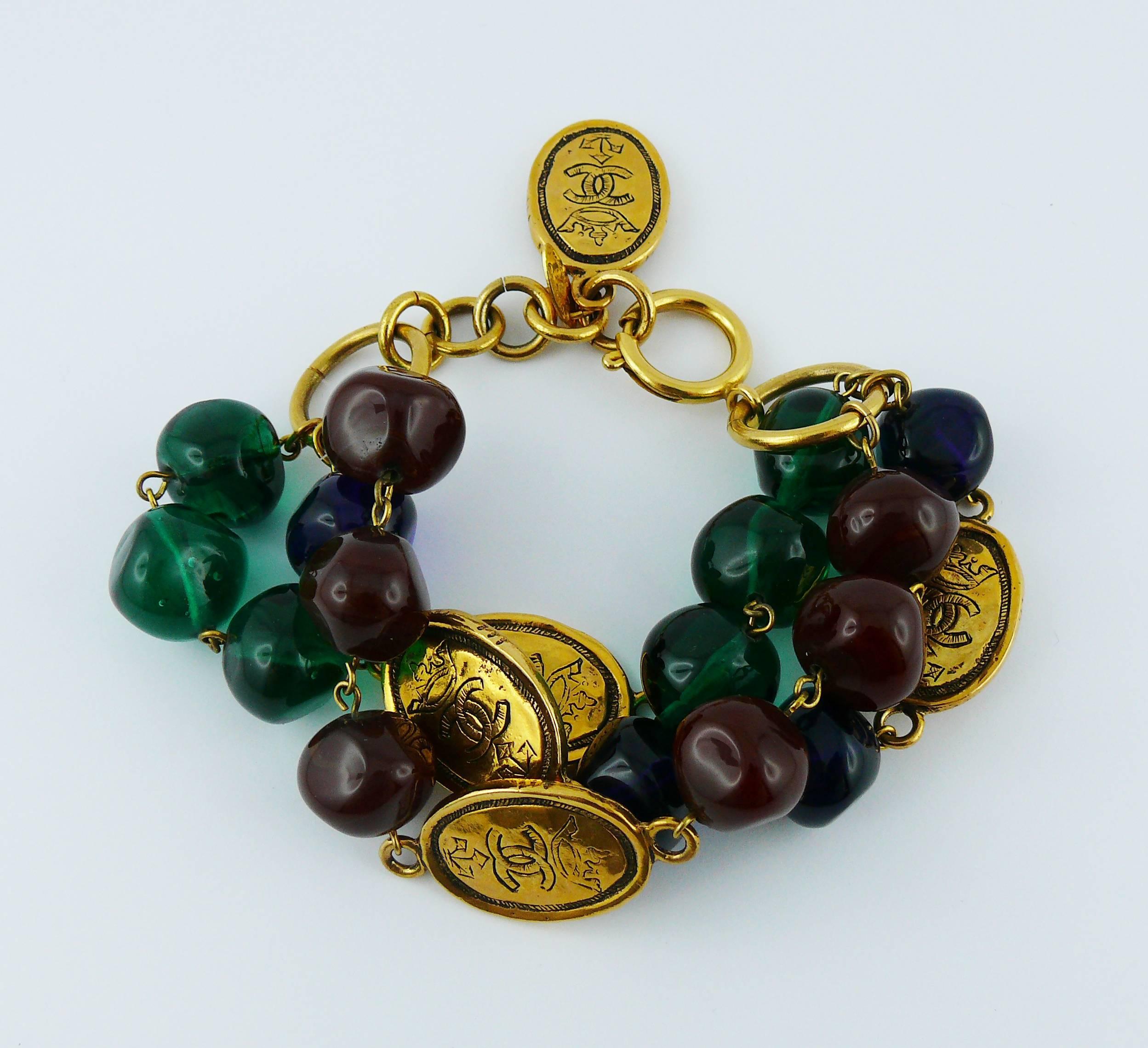 Chanel Vintage Gripoix Glass Bead and Crowned CC Coin Triple Strand Bracelet In Excellent Condition In Nice, FR