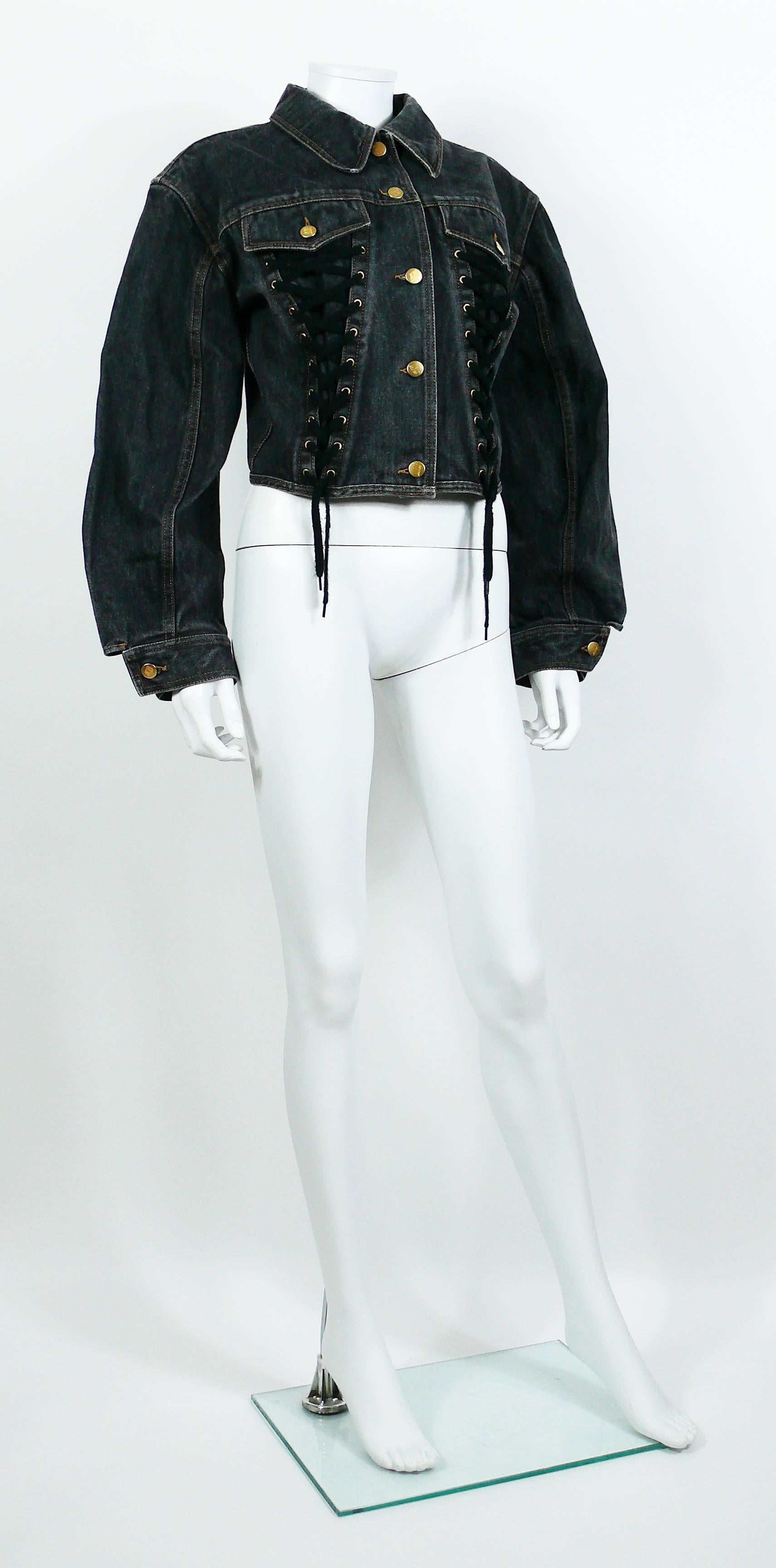 JEAN PAUL GAULTIER Junior vintage black denim iconic corset style jacket.

This jacket features classic collar, front button fastening, front lace up detail, long sleeves with button cuffs and pocket detail at the chest.

Label reads JUNIOR GAULTIER