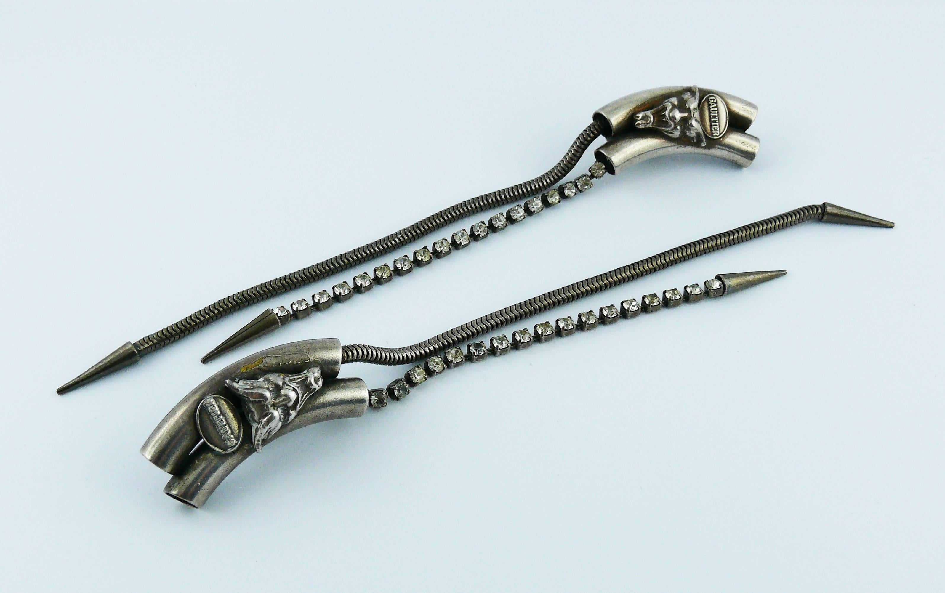 JEAN PAUL GAULTIER vintage extra long gun patina clip-on earrings featuring tubular sections, demon mask, clear crystal and snake chains.

Marked GAULTIER.
Matching dog collar necklace published in our inventory.

Indicative measurements : max.