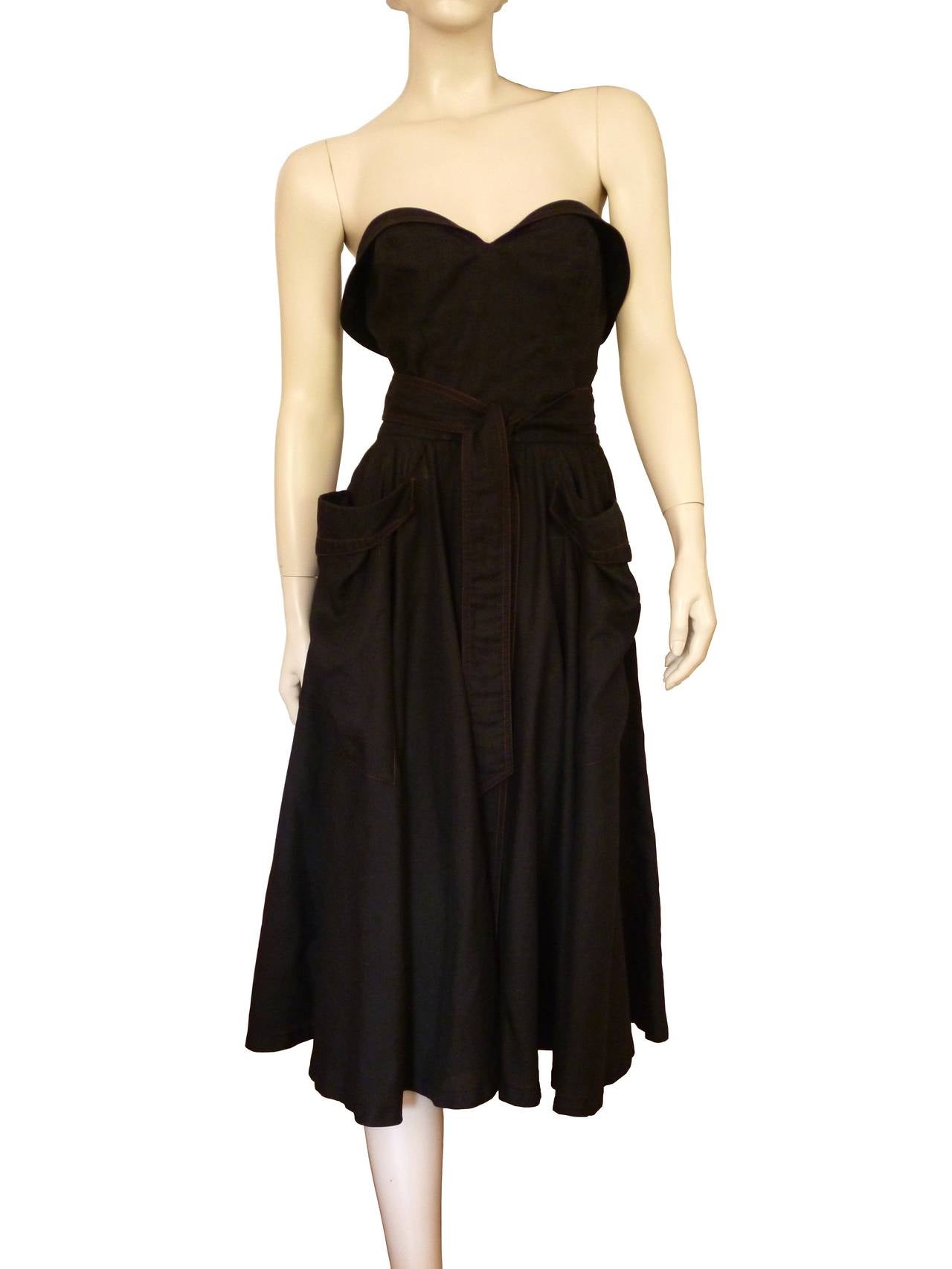 THIERRY MUGLER gorgeous vintage black linen bustier dress.

Two large pockets at the front, a back button closure and a long belt
 Red stitching detail.

Label reads 