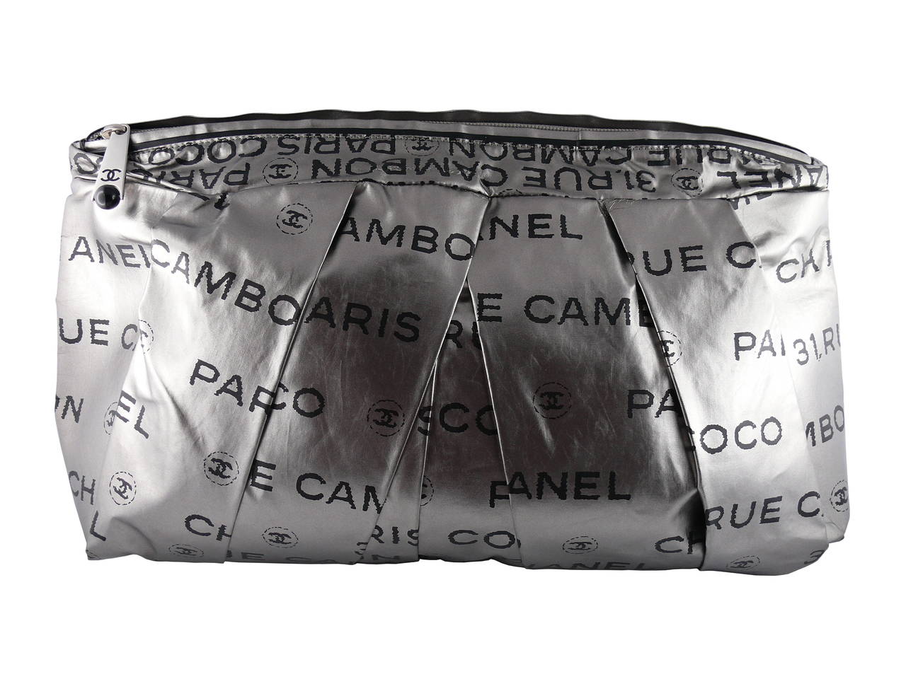 CHANEL Unlimited Line clutch from the Spring 2009 collection.

Pleated metallic silver fabric printed with 