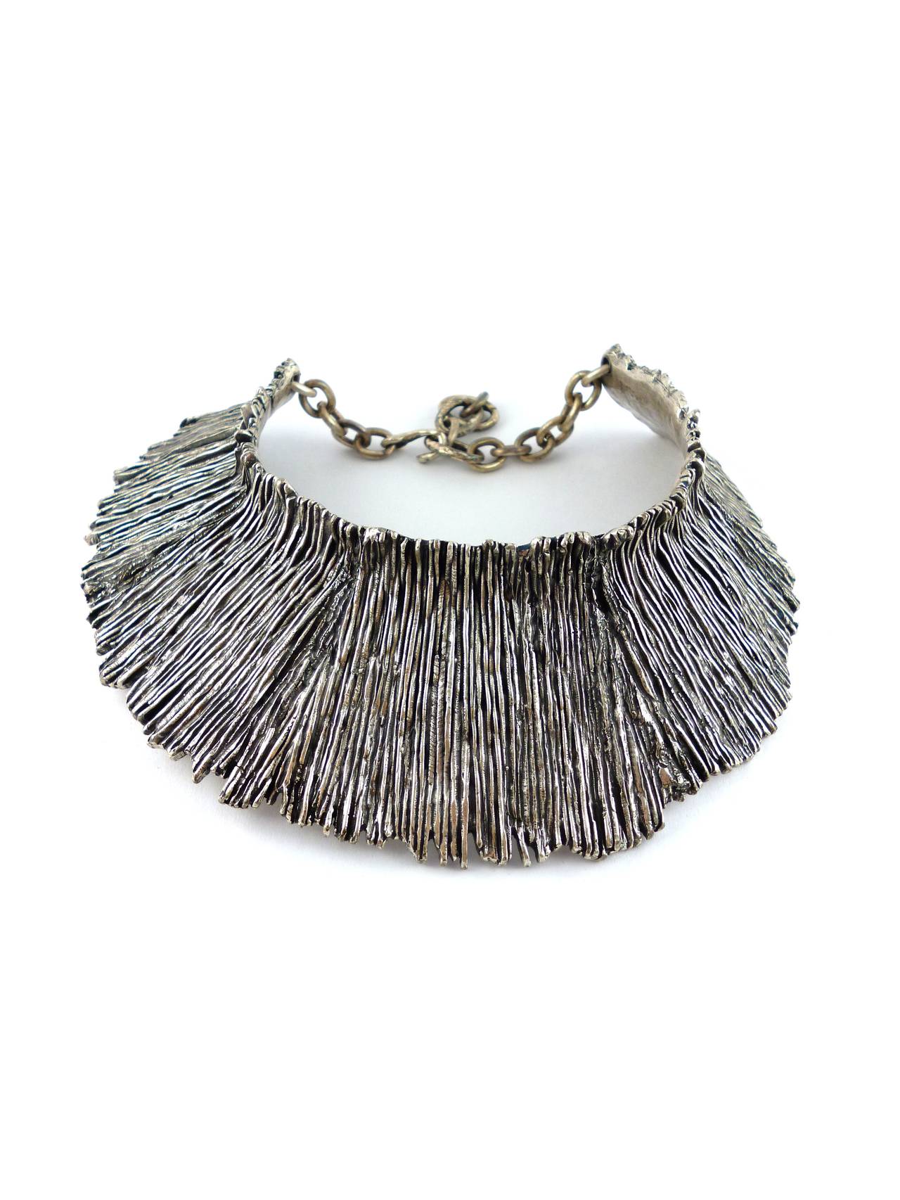 BICHE DE BERE Paris asymetrcial massive brutalist metal collar necklace.

Deeply ribbed silver tone metal giving a stunning abstract 