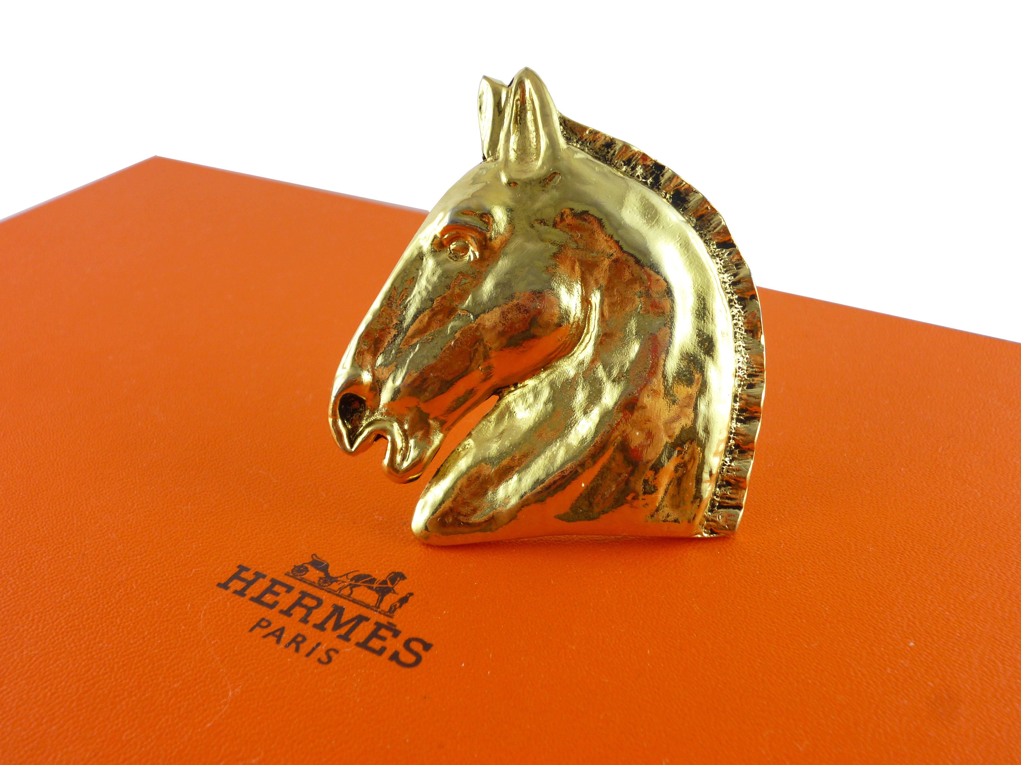 HERMES Paris vintage massive three dimensional gold tone horse head brooch.

Embossed HERMES Paris Bijouterie Fantaisie.

No box provided.

Note
As a buyer, you are fully responsible for customs duties, other local taxes and any