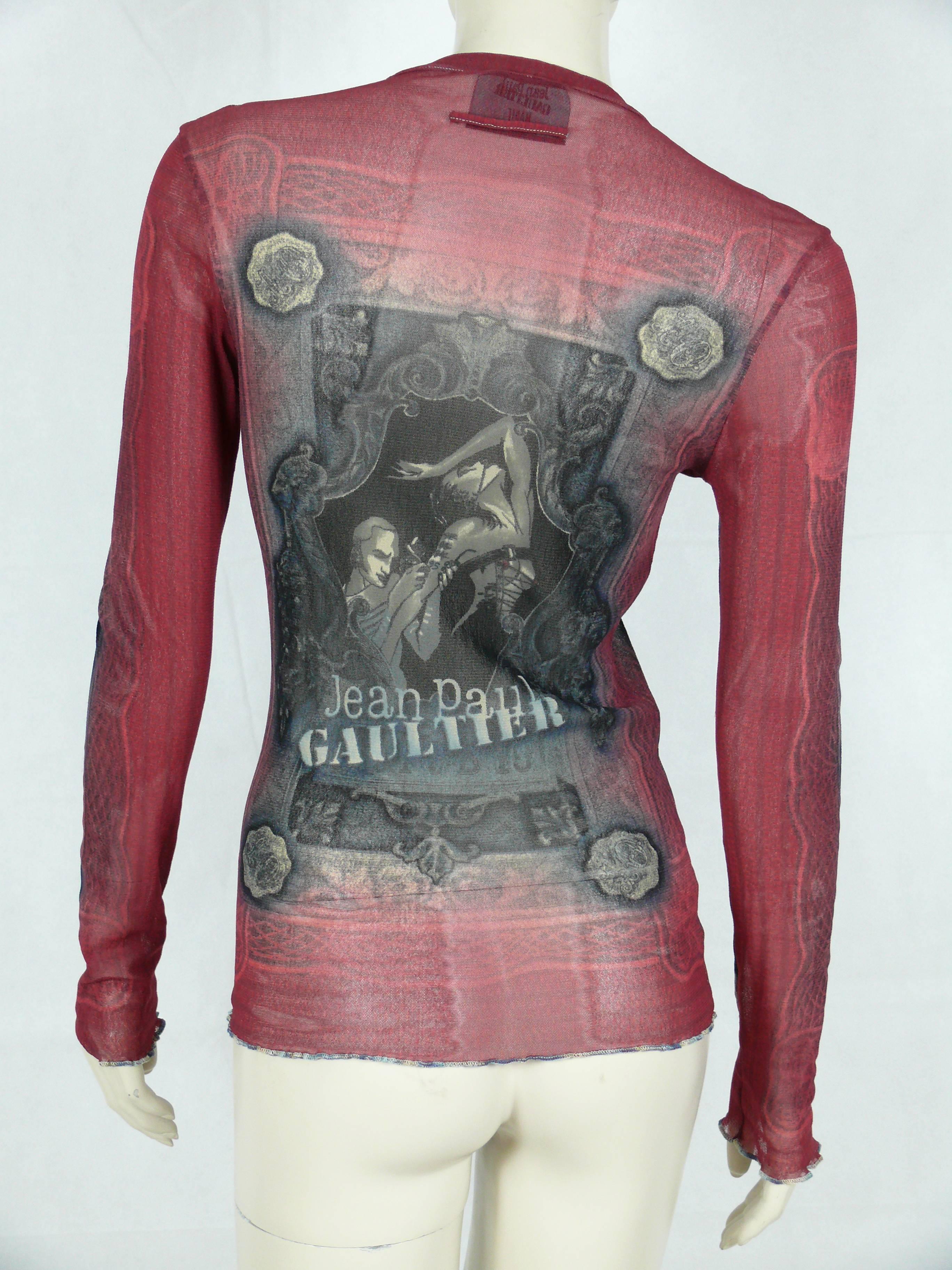 JEAN PAUL GAULTIER Wunderschönes Tattoo Fuzzi Mesh Unisex-Top. 

Auf dem Etikett steht JEAN PAUL GAULTIER MAILLE Made in Italy. 

Größenetikett fehlt. 
Bitte überprüfen Sie die Maße. 

Auf dem Etikett der Zusammensetzung steht: 100 % Polyamid.