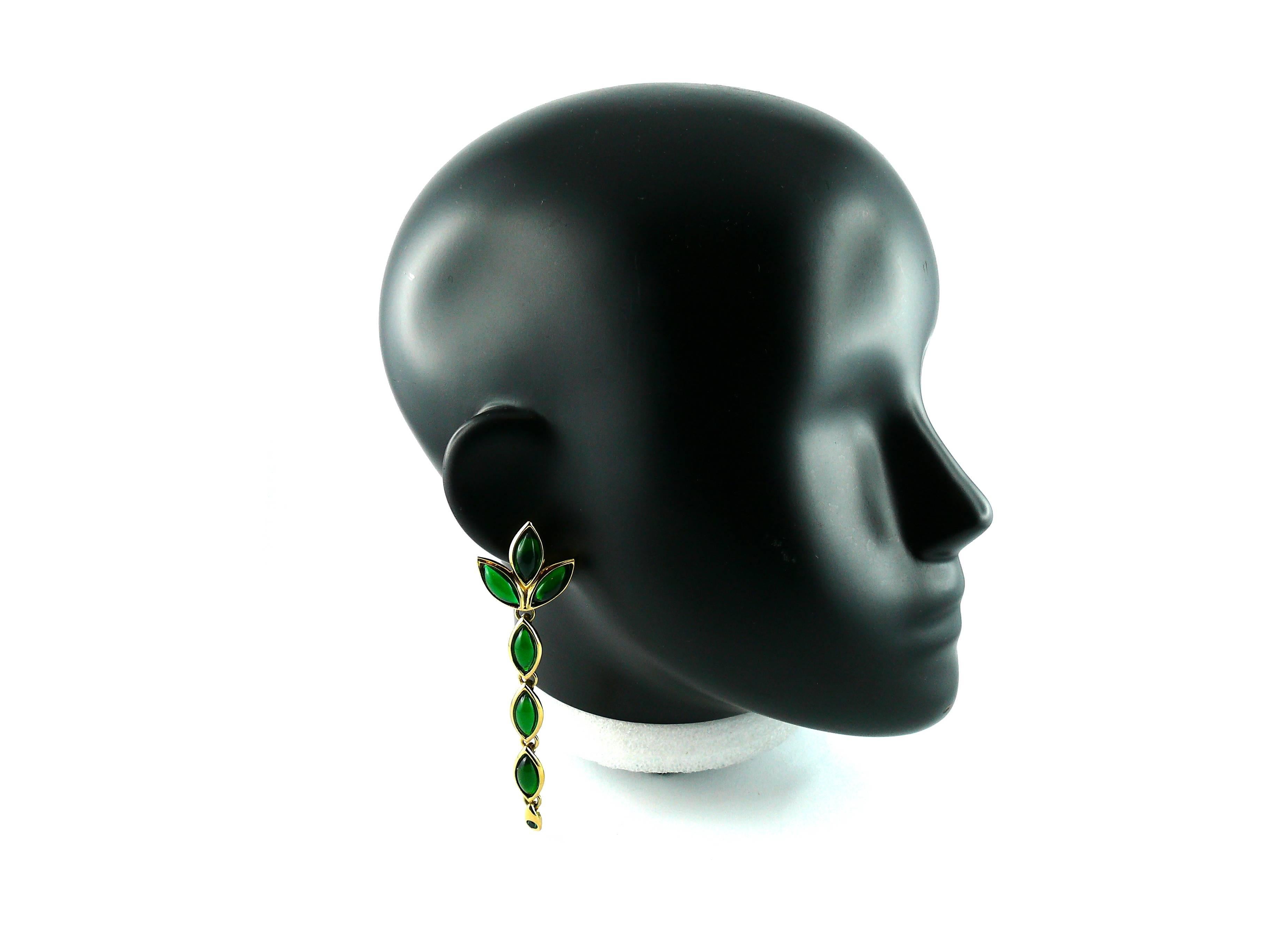 YVES SAINT LAURENT vintage faux emerald dangling earring (clip-on).

Marked YSL Made in France.

JEWELRY CONDITION CHART
- New or never worn : item is in pristine condition with no noticeable imperfections
- Excellent : item has been used and