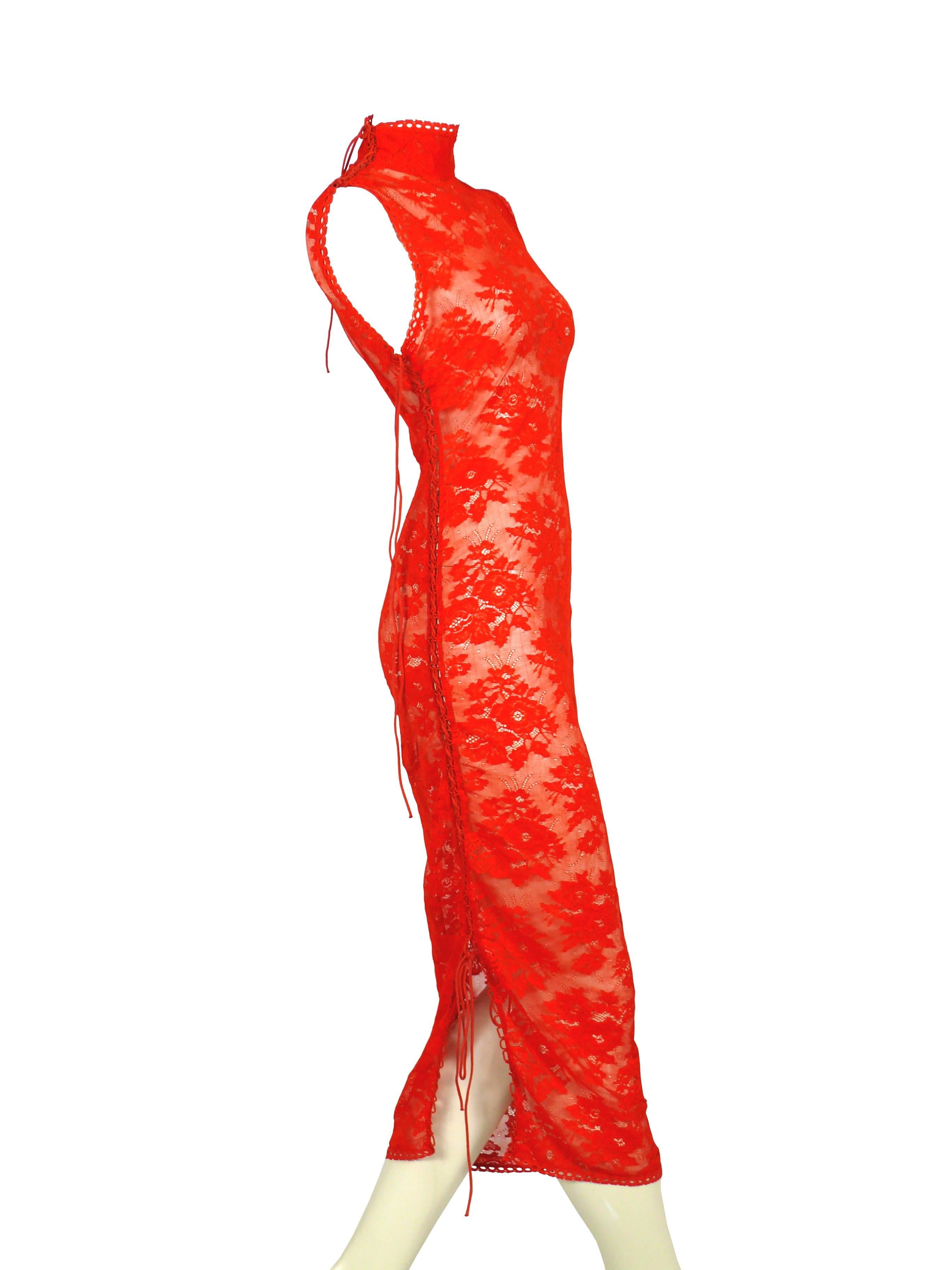JEAN PAUL GAULTIER vintage rare lace dress featuring a floral pattern.

Gorgeous flashy red color with orange shades.

Corset lace like on one side that goes from the collar to the bottom of the dress.

Label reads JEAN PAUL GAULTIER Maille