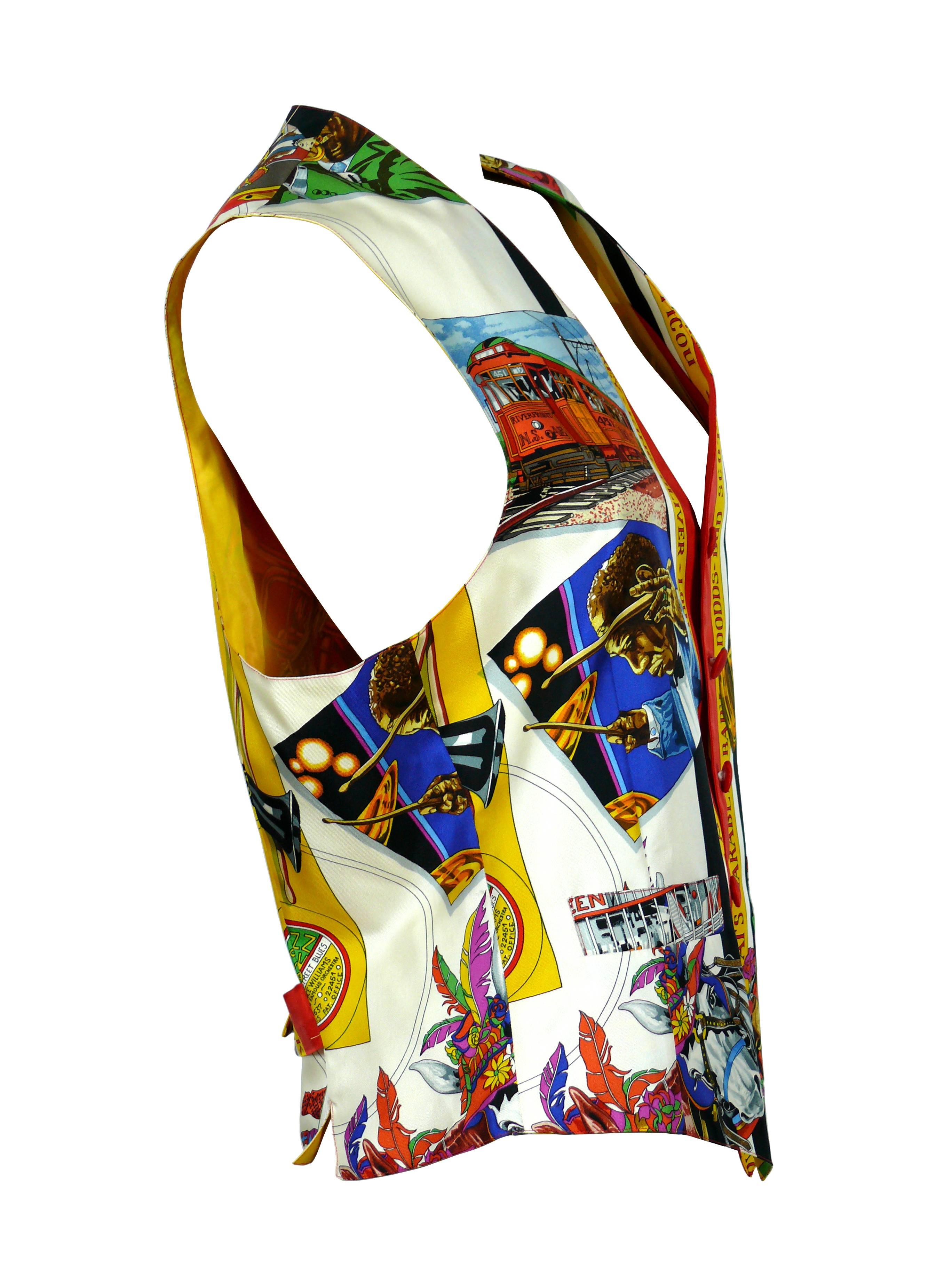 HERMES New Orleans Jazz printed vest featuring iconic jazz memorabalia and musicians.

Multicolor design on a off-white background.
Five front buttons.
Two slip pockets on front.
V-neck.
Back tie.

Label reads HERMES.

Size tag reads : 50.
Please