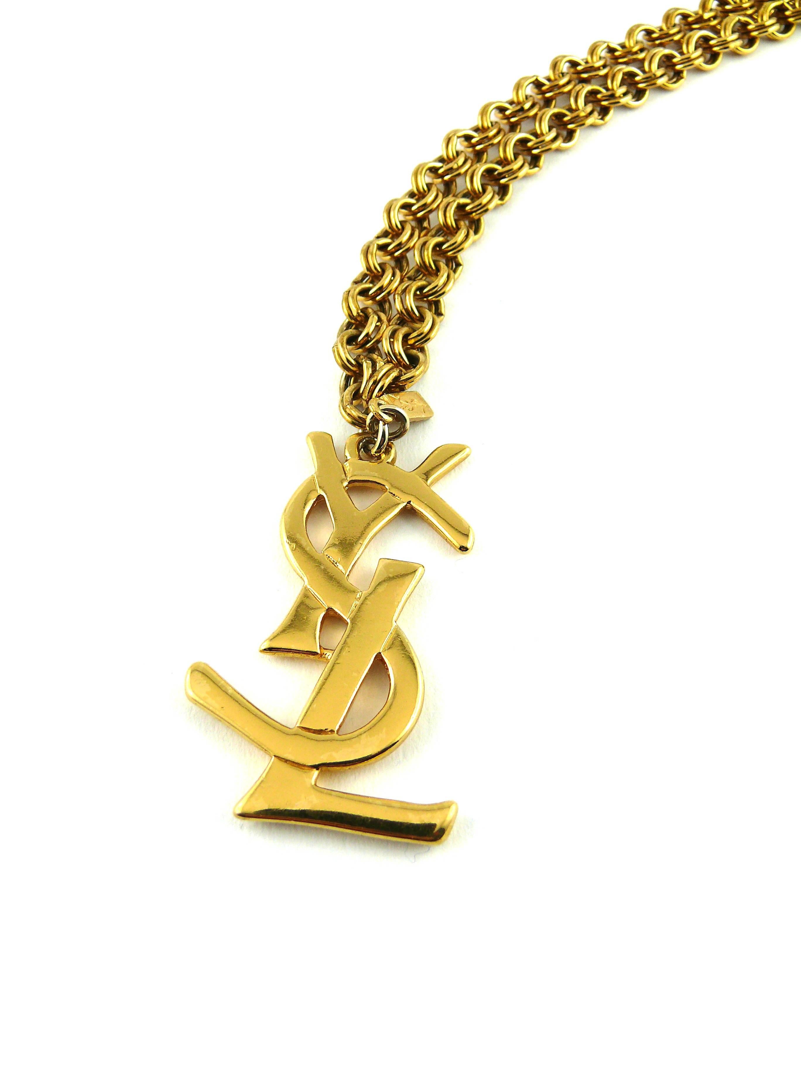 YVES SAINT LAURENT vintage chunky gold tone chain necklace featuring a large iconic YSL logo.

"Love" heart clasp.

Embossed YVES SAINT LAURENT Made in France on the clasp.
Hanging tag YSL Made in France close to the logo