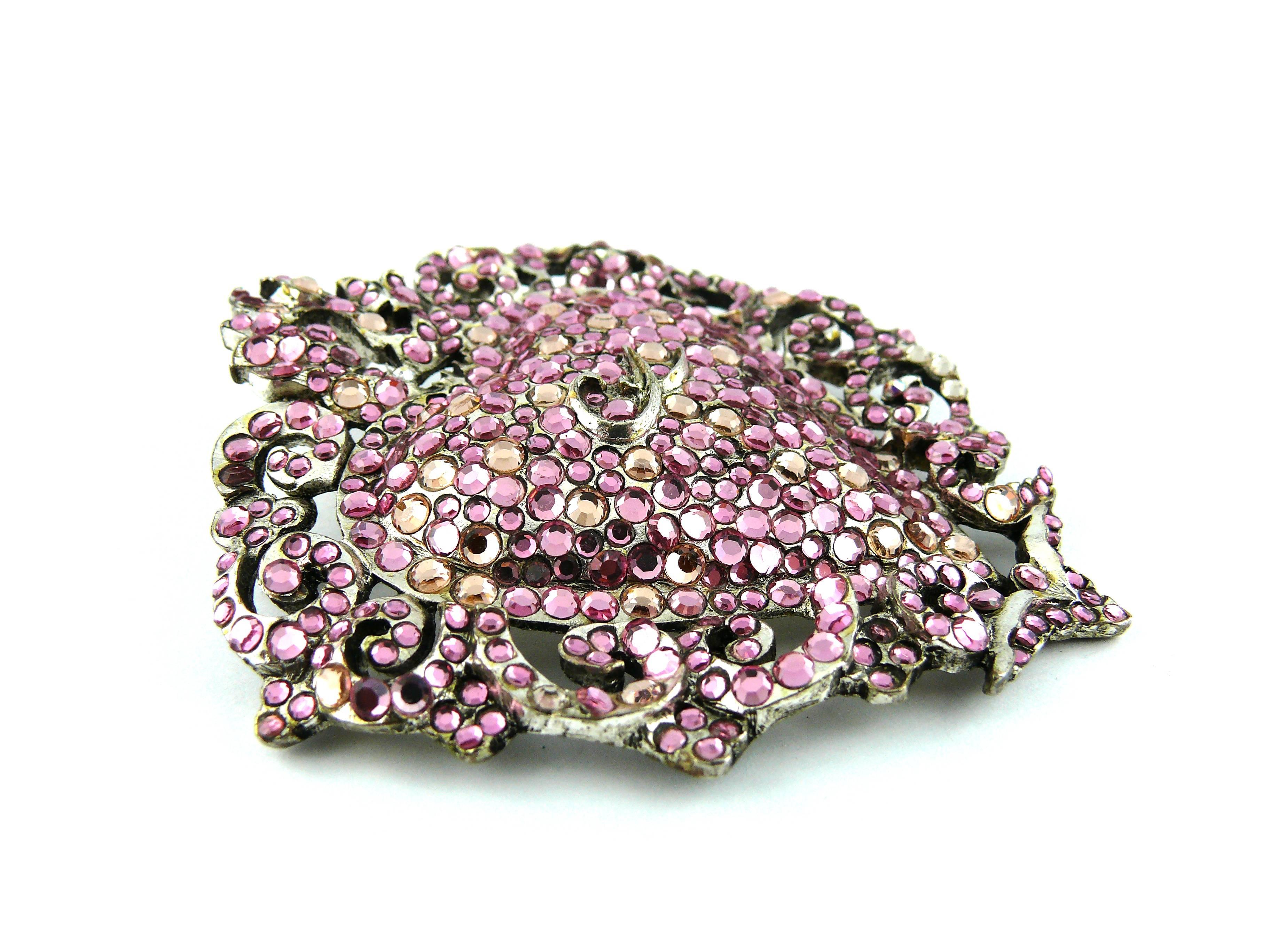 CHRISTIAN LACROIX vintage massive heart brooch and pendant with multicolored rhinestone embellishement in a silver tone setting.

Marked CHRISTIAN LACROIX Made in France.

JEWELRY CONDITION CHART
- New or never worn : item is in pristine condition